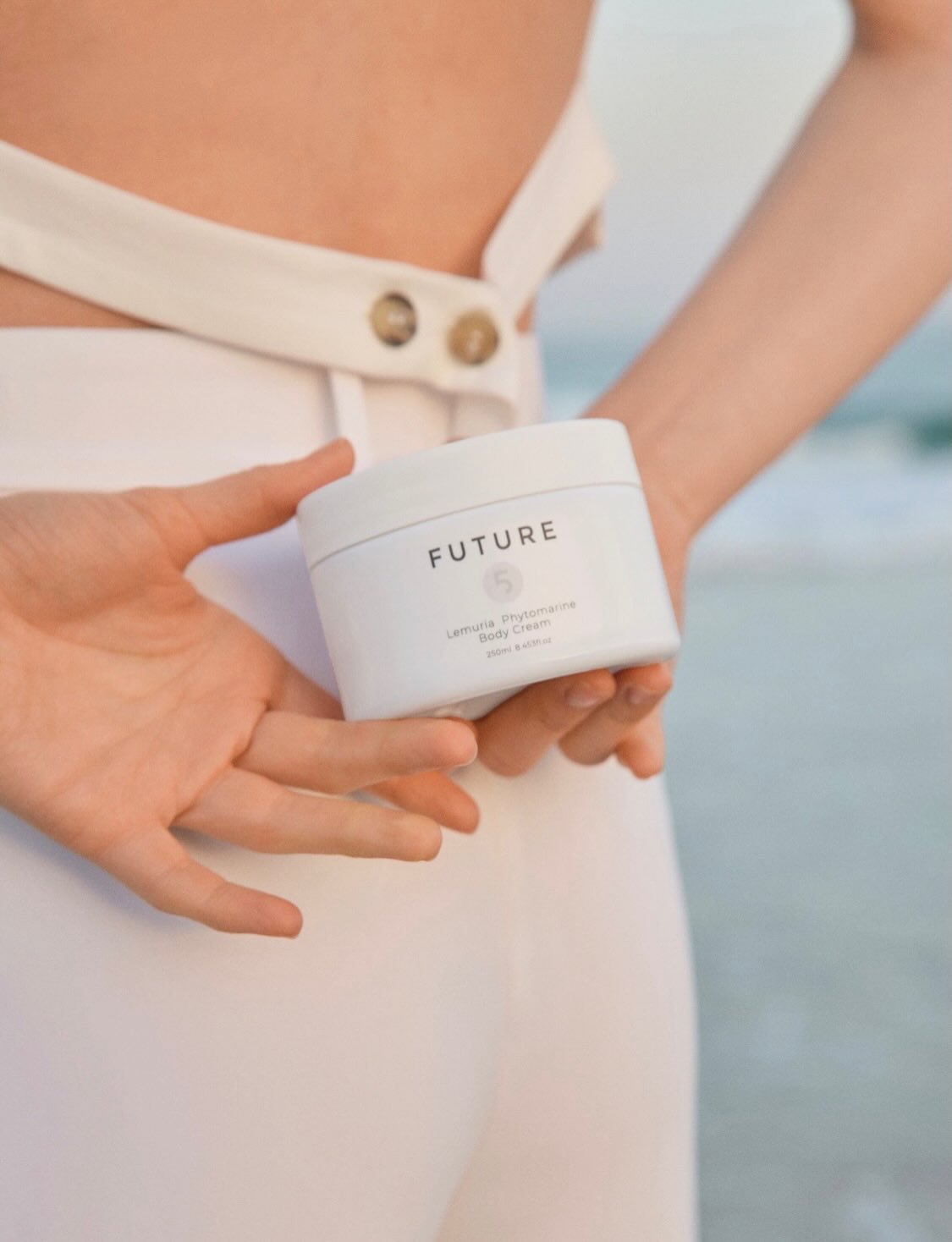 The secret to a youthful décolletage is out!
Within every stroke of Lemuria Phytomarine Body Cream, the neck and décolletage rejoice.
Empowered by the tender firming caress of ginseng, ginkgo biloba, and our carefully selected algae – all trusted guardians of skin’s firmness and suppleness – this body cream is the luxurious key to a smooth, lifted, and fresh-looking neck and décolletage.
As natural as the rhythm of the tides, it is a timeless ritual for a silhouette that is refined and lifted, a silent yet formidable guardian against the relentless march of time.
Revel in the whispered legend of youthful grace, and claim this best-kept secret!
#future5elements #LemuriaPhytomarine #décolletagecare