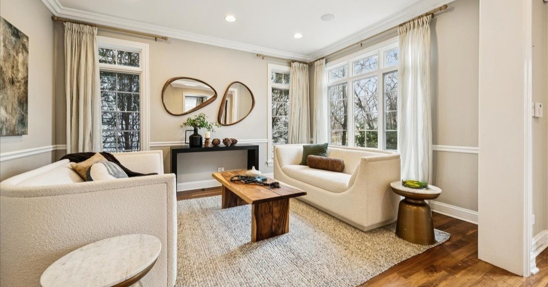 Symmetry but with a little twist with some mirror placement fun! #symmetry #mirrors #luxe #living #chicago #chicagorealestate #havenhomestager #chicagohomestaging #stagingworks #stagingsells #staging #homestaging