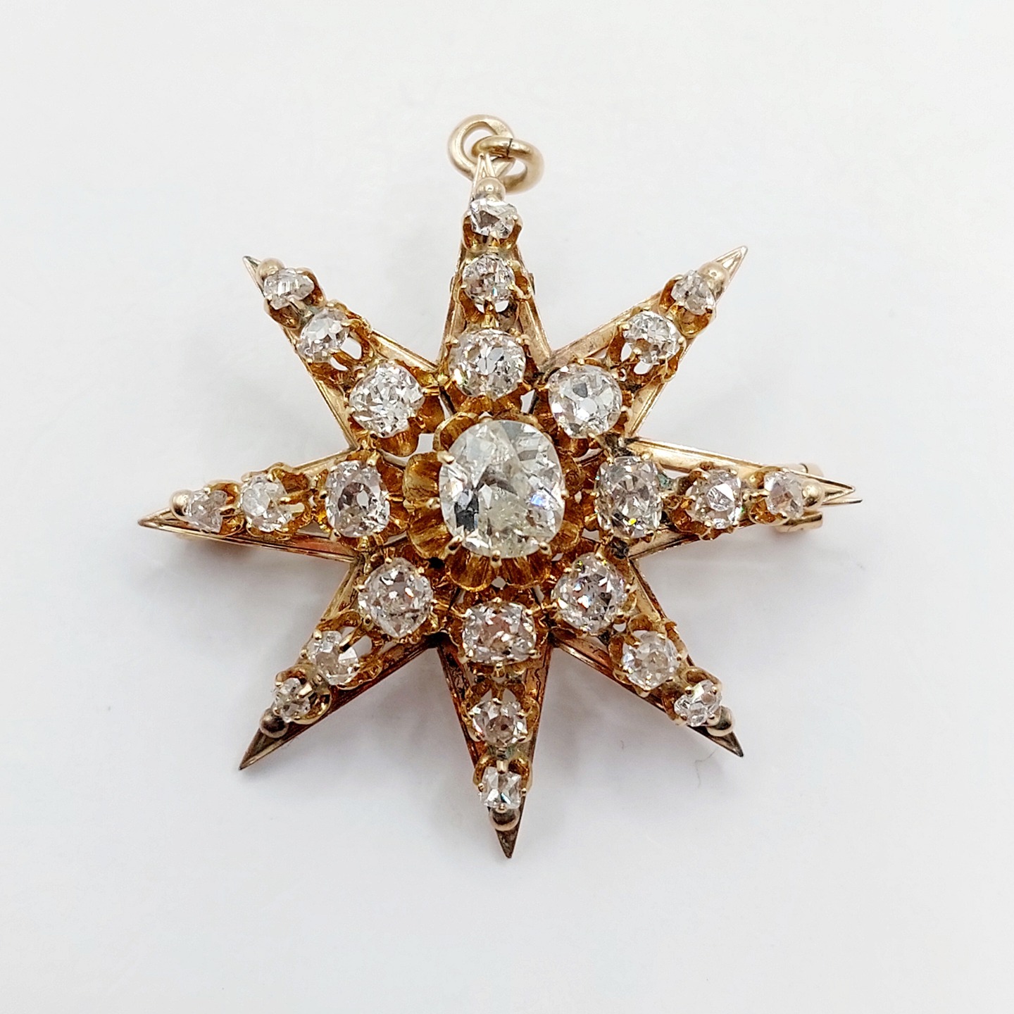 Antique star pendant 14k gold set with 3.30 carats of old mine cut diamonds (circa 1900)
PRICE : 3400€
Magnificent antique goldsmithing
Size: 39 mm (star only)
Weight: 12.64 g
Main diamond size: approximately 6.9 x 6.2 x 4 mm (estimated at 1.10 carats)
Secondary diamond size (x8): approximately 3.5 to 3.8 mm (estimated at 1.30 carats total)
Secondary diamond size (x16): approximately 2 to 3 mm (estimated at 1.00 carats total)
Diamonds in good overall condition, with visible natural inclusions
The pin is 18k gold (it can be removed upon request free of charge)
Micro scratches from use, traces of old solder joints
Scallop shell hallmark on the bail, owl hallmark on the pin (French hallmarks)
#diamond #artdeco #artdecocharm #goldcharm #goldpendant #frenchjewelry #frenchjewellery #oldminecut #oldminecutdiamond #daisycharm #starpendant