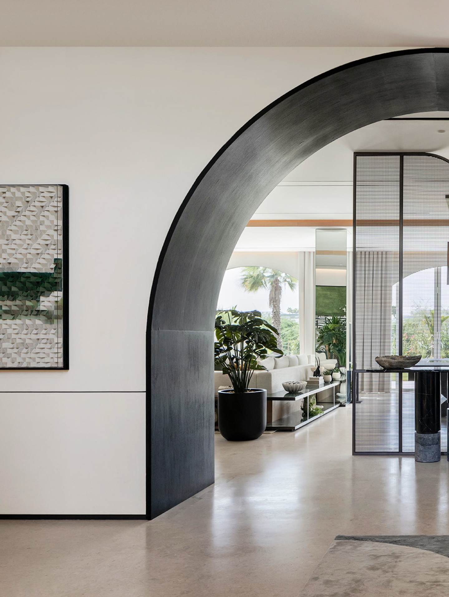 Bold architectural gestures meet curated FF&E selections. From the statement island to the arched transitions, every element is unified by a palette of stone, wood, and soft textiles that express understated luxury.
Photographer: @toozestudio
#InteriorDesign #Design #Dubai #luxury #highend