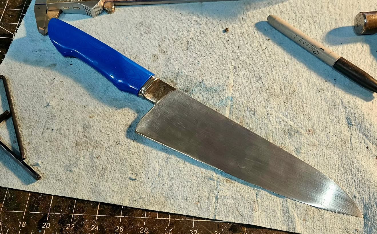 Working on this lovely chef today. This is part of a set with a paring knife. Both have blue g10 handles and stainless steel bolsters. This is a custom order, the blades have been forged from an extremely large file that was in the family of the client. It will be exciting to see these done.