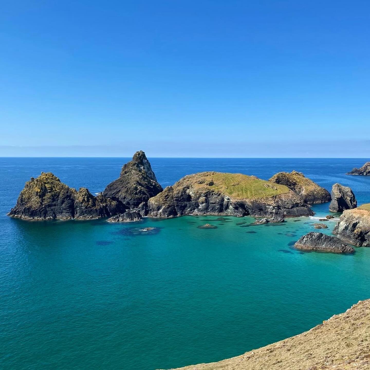 I thought I’d provide you with a bit more information about the places we visit on our Geowalks. Next on the list - Lizard Point to Kynance Cove.
This walk along the coast at the southernmost point of Britain is also a journey through the exotic geology and landscapes of the Lizard Peninsula. Discover the origins of famous rocks like serpentinite, and explore the boundary where two tectonic plates once collided!
The breadth of Cornish geology even includes its own ophiolite – a fragment of oceanic crust! Get your hands on exotic rocks that formed in the Earth’s mantle, and learn about their dynamic journey to where we can see them on the Lizard.
Discover of the origins of this rock that the Lizard is most famous for. Learn about the processes that gave us this popular ornamental stone, and its other uses as a source of industrial minerals. You might also find the infamous soapstone used for making porcelain.
Lizard Point isn’t only a geographic landmark, but a geological one too. These are the oldest rocks in Cornwall, around 500 million years old! Discover these rocks that experienced extreme pressures and temperatures on their journey to where we see them today.
Experience the impact of global tectonics that moulded the dynamic landscape around us. See where two mighty tectonic plates once collided, and learn how they dragged up rocks from deep inside the Earth.
#lizardpoint #tectonic #kynancecove #igneous #tectonics #geowalks #geotours #geologyeducation #cornwall #cornwallcoast #cornishcoast #walkingcornwall #explorecornwall #lovecornwall #cornwallgeology #cornishgeology #geology #geologyrocks #geolife #geologist #geologistsofinstagram #learninggeology #geoadventure #exploregeology #geologicalwonders #amazingcornwall #cornwallliving #visitcornwall #geologyfieldtrip #geologylife