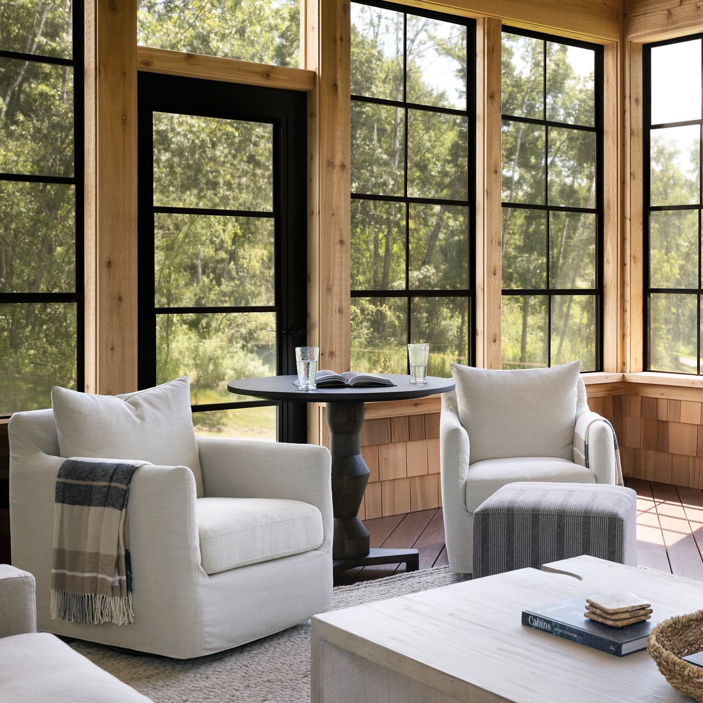 Wrapped in windows and natural light, this porch was designed for every season and every mood. #projectintothewoods
Build: @divinecustomhomes
Design: Haven Design Collective
Photography: @spacecrafting_photography