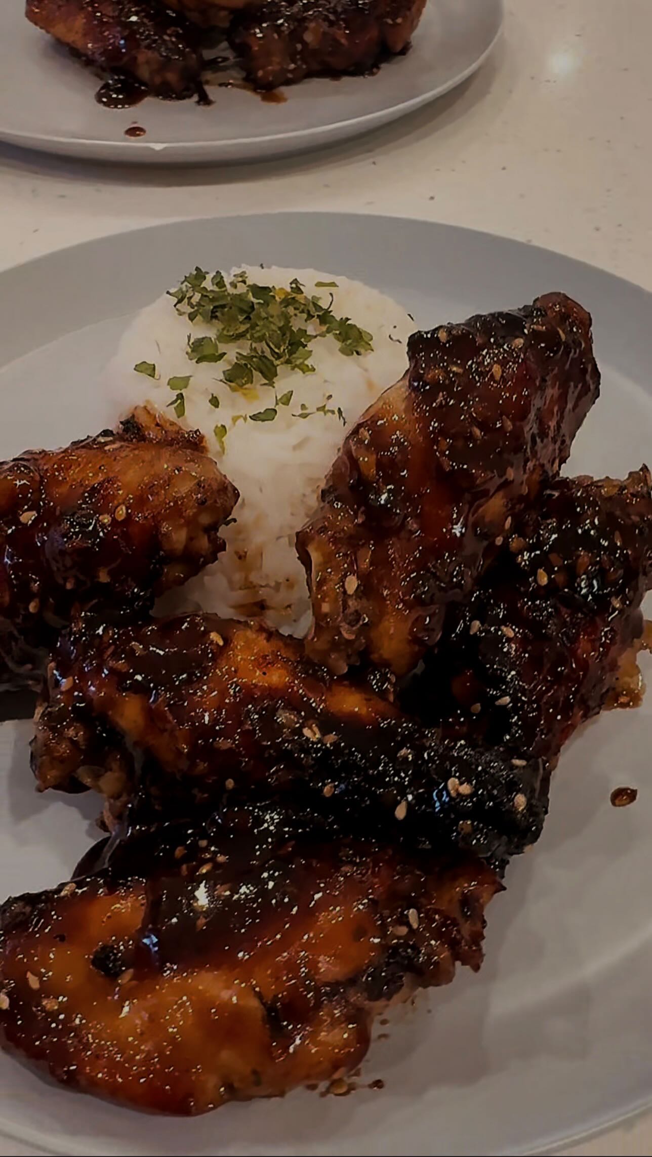 Try this recipe and THANK ME LATER!!!
20-Minute Sticky Teriyaki Chicken Wings (Air Fryer)
These wings are sweet, savory, sticky, and dangerously easy. Perfect for a quick dinner or an at-home takeout moment.
Ingredients
• 13–14 chicken drumettes, cleaned and patted dry
• Salt & black pepper (only)
• Cooked white rice, for serving
Homemade Teriyaki Sauce
• ½ cup soy sauce
• 2–3 cloves fresh garlic, minced
• 1 tbsp fresh ginger, grated
• ¼ cup brown sugar
• 2 tbsp honey
Instructions
1. Air Fry the Wings
Season drumettes generously with salt and pepper.
Air fry at 380°F for 16–18 minutes, flipping halfway, until golden and crispy.
2. Make the Sticky Teriyaki Sauce
While wings cook, add soy sauce, garlic, ginger, brown sugar, and honey to a saucepan over medium heat.
Simmer for 5–7 minutes, stirring occasionally, until the sauce thickens and becomes glossy.
3. Toss & Finish
Add hot wings directly into the saucepan. Toss until fully coated in the sticky teriyaki glaze.
4. Serve
Spoon wings over a bed of rice. Extra sauce encouraged.
Timing
• Total time: ~20 minutes
• Prep + cook with zero stress
Optional Finish
Sesame seeds, green onions, or a drizzle of extra honey for shine.
Simple. Sticky. Repeat-worthy.
My @caraway_home CODE: THECOOKINGSNOB