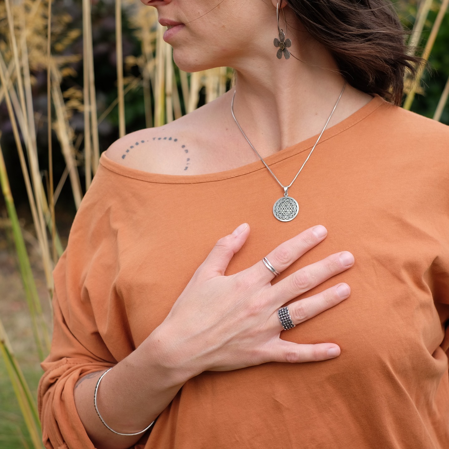 ~ WITNESSING ~
Awakening the witness is the theme we explored the other evening in a Therapeutic/Vagus Nerve Yoga class that is part of the 8-week course in @thesanctuaryd7.
What does being a witness to our experience mean? It sounds so simple yet it isn't easy.
Witnessing our thoughts, emotions, sensations invites us to be non-judgemental and rather than building on what is an expression of our current state, we observe our experience with curiosity. When we are curious, we cannot be judgemental. With curiosity, we are open and don't assume what is right or wrong.
Our body and mind are interconnected and this shows so much when a certain thought evokes tightness or contraction in the body or vice versa when a pain in the body or an emotion brings up a belief we have about ourselves/others/the world.
Learning to observe how these experiences move through us creates a bit of space between our true self/our essence/ the unchangeable aspect of our nature and that which we experience.
This is not about detachment. It's about perspective. I found myself feeling a huge difference between being a witness to my experience and being absorbed/consumed by it. In the witnessing, there is a bit of a distance and plenty of space to choose how I want to respond. When I am consumed by what I feel, think or believe, it takes over - it feels like there is no escape. A few weeks ago, I did catch myself being in the latter - and to realise that is a reminder of how easy we can over identify ourselves with what we think, feel. We don't need to make the overidentification wrong but to be aware of how it impacts our life is so incredibly powerful.
Witnessing is a way to slow down the inner chatter, to observe without adding to the story. It's the practice of what we call in yoga Ahimsa - non-violence. Ahimsa starts with ourselves.
It's not always easy but it is an invitation to experiment, to inquire into the realm of our inner landscape.
X
Anna
#witnessing #mindfulnesss #yoga #witness #nervoussystem #ahimsa #therapeuticyoga #embodiment