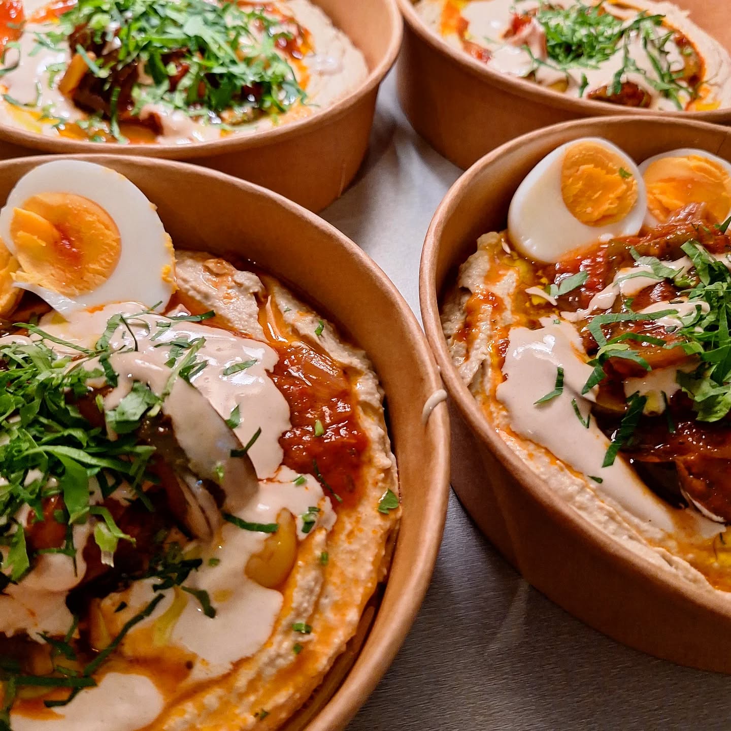 You have 2 options:
1. Dine in & praise Hummus with us.
2. Order to go & praise it somewhere else😉