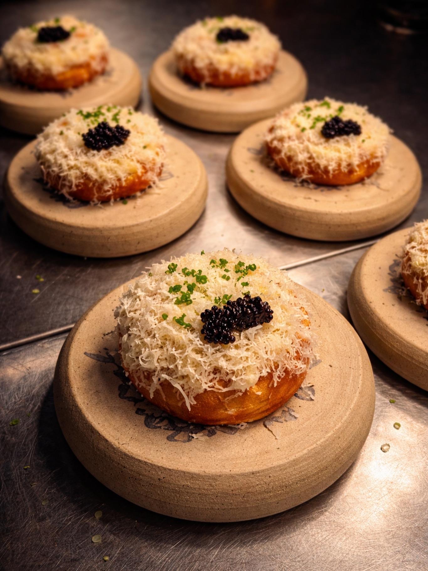 If French onion soup was a doughnut…
Gruyere Doughnut
Yeasted Doughnut | Béchamel | Caramelized Onion Jam | Gruyere | Fermented Garlic Honey | Caviar
We’ve been serving this as our bread course to start recently. Something crispy, warm and savory to start.