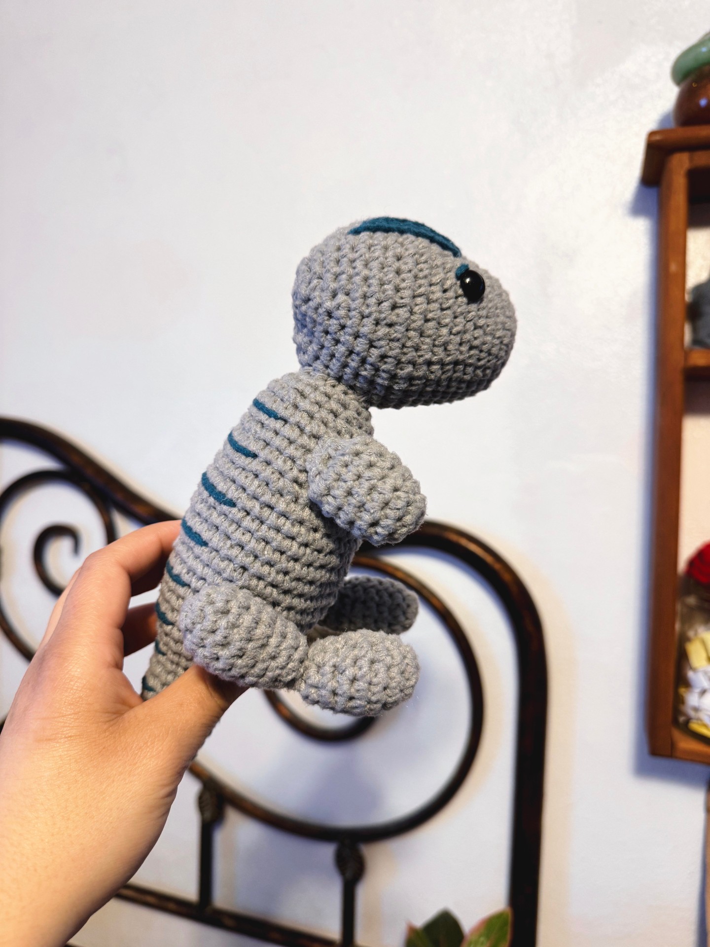 I finally made this long awaited velociraptor and was able to gift it this past Christmas! I was having trouble finding a pattern that I liked. Velociraptors are not necessarily cutesy creatures, and I kept finding patterns that were very involved and complex, or patterns that weren't detailed enough. I needed a pattern that was detailed and cute enough for a six-year-old to recognize what the finished creation was.
I ended up finding this pattern on the @thekindnesscompanyhq blog through Pinterest. You can find the link to this velociraptor pattern on my Ravelry (link in bio) or on my Pinterest board "The Patterns".
*
*
*
*
*
#womanownedbusiness #shopsmallbusiness #handmadegifts #crochetgift #handmade #dinosaur #velociraptor #handmadekidsgift