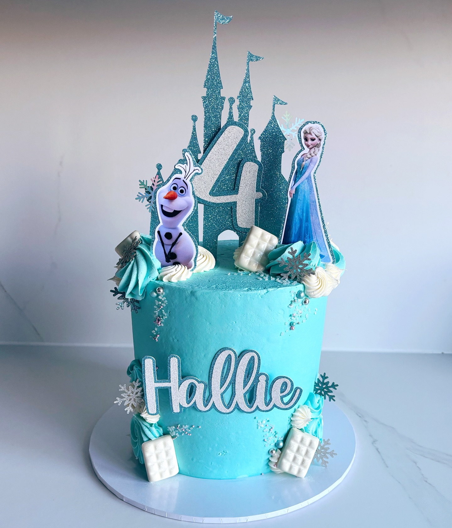 ❄️ Frozen throwback! ❄️
Can’t believe I never posted this beauty from last year 💙
A custom Frozen-themed birthday cake made for little Hallie’s big day! ✨
👉 Swipe for the swirl because that buttercream swirl was absolute perfection 😍
Got an upcoming celebration?
✨ Enquire now & DM us to secure your date ✨
#ThrowbackCake #CustomCakes