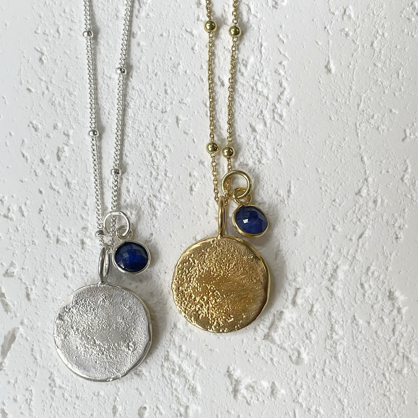 Some bespoke moons I made a while back with some ashes and the sand from their favourite beach that they loved to visit 💛