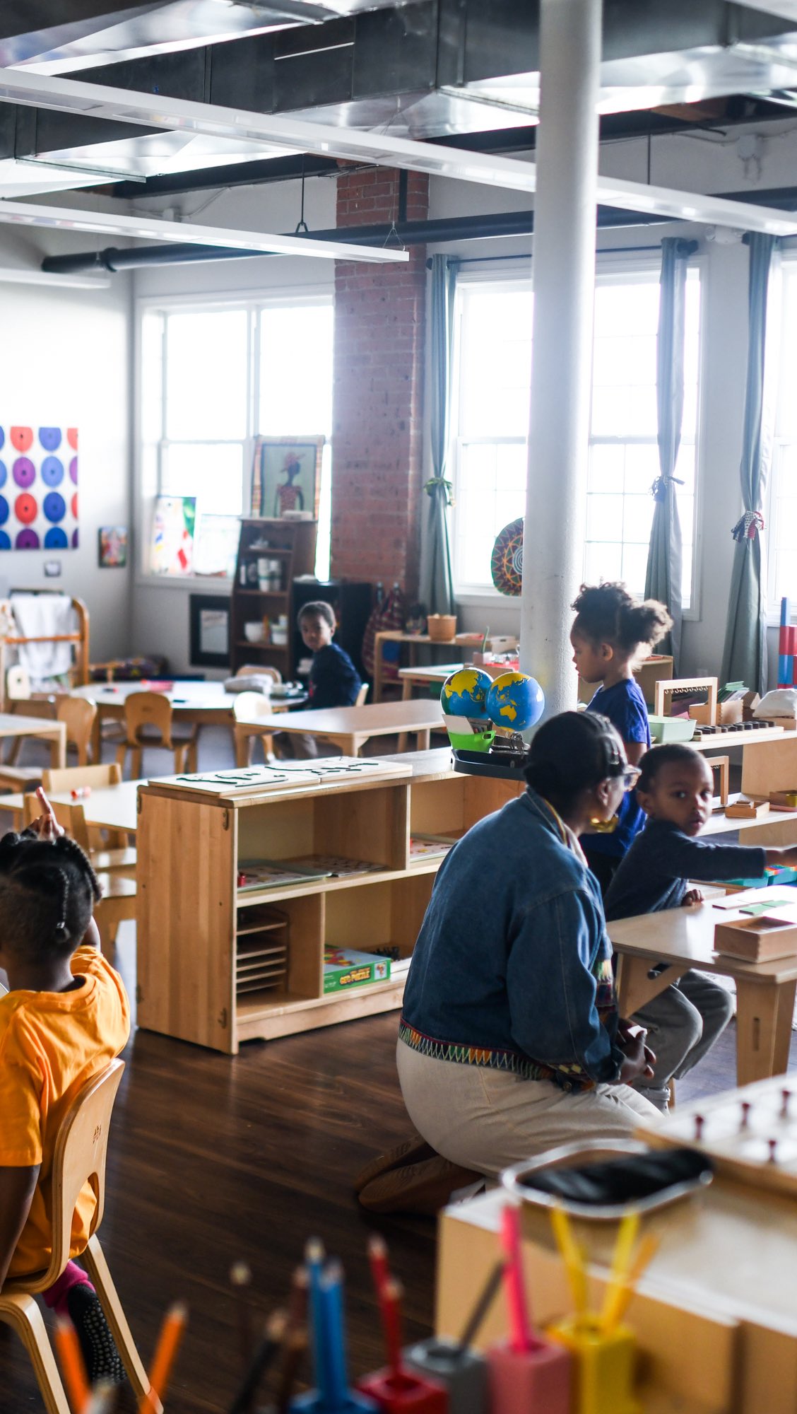 While our work has always been rooted in African and African diasporic traditions, we recognize that Black children are not a monolith. Their identities are shaped by many cultures, histories, languages, and lived experiences. To honor that truth, we are shifting our language from “African-centered” to “culturally affirming.”
This change allows us to be clearer and more inclusive about what we actually do: we affirm children’s identities as they are, while grounding them in dignity, belonging, and liberation.
What has not changed is our commitment to centering the Black child! Because we know that when Black children are free, all children are free. Black children continue to experience the greatest impact of systemic harm, and they remain at the heart of our mission. We have learned in the last 3 years that SLC has attracted families seeking a safe learning environment for their children. From Latinx families to non-binary parents and multicultural families, our liberation is bound together.
The term culturally affirming allows us to:
• Honor African and African diasporic roots without assuming a single cultural expression
• Affirm the full range of Black identities and experiences
• Extend affirmation to all children without diluting our commitment to Black liberation
This shift is not a move away from our values…it is a refinement of our language to better reflect our practice, our growth, and our responsibility to the community.
Our purpose remains the same:
To nurture whole, free, and brilliant Black children and in doing so, help build a world where every child can thrive.
Black children are still the center.
They are still the priority.
And they always will be.
#montessori