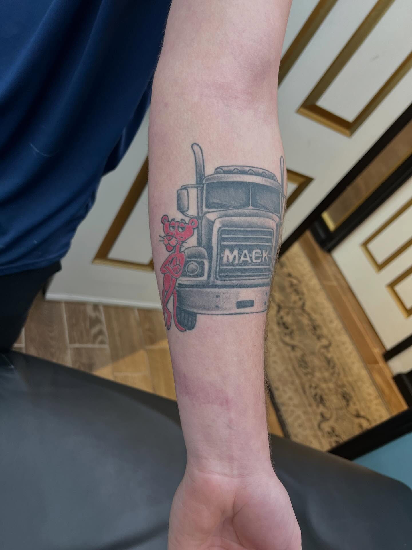 Got a healed pic of this super cool Mack truck… #tattoos #tattooartist #pinkpanthertattoo #macktruck