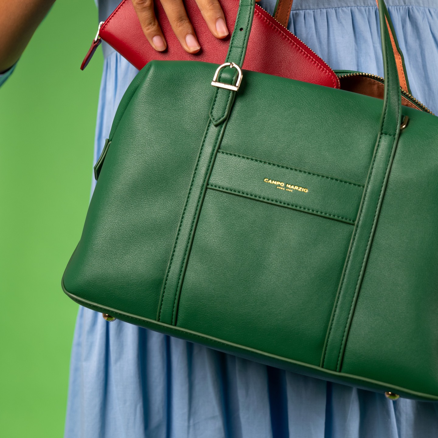 Our Blair Bag in Spring Green with Orange interior. Summer never looked this stylish.
