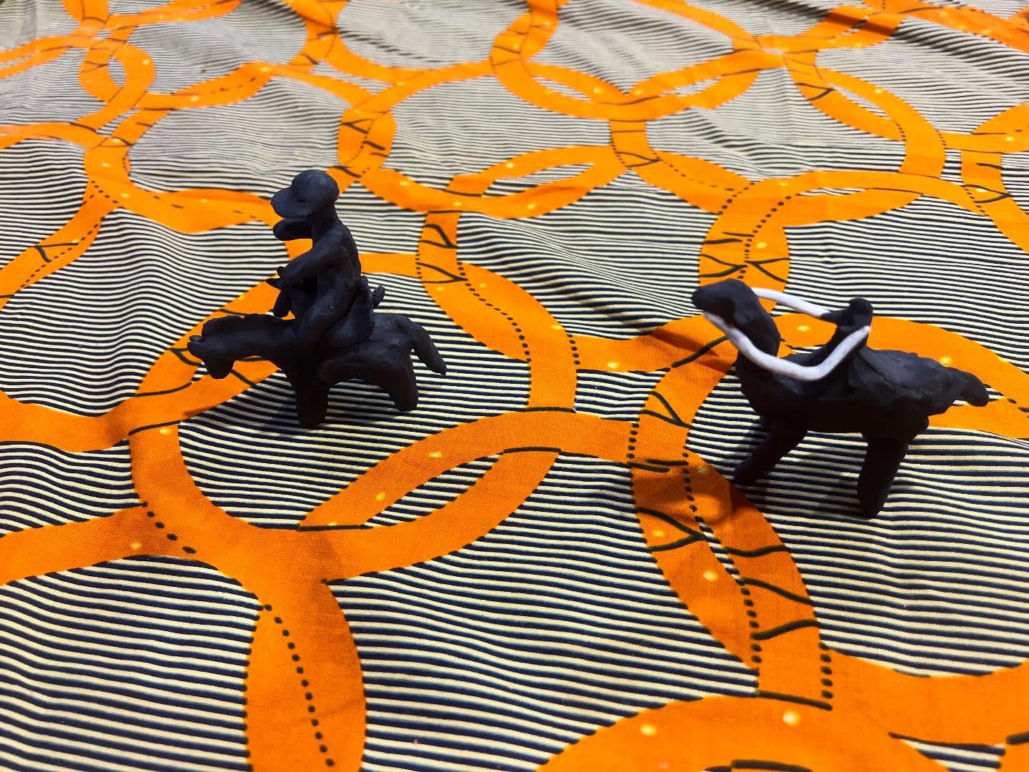 CIRCLING THE TABLE, CIRCLING THE WORLD
Calais, January 21, 2026
Today was our first visit to Calais this year, and there was a positive atmosphere in the @calais.exilessc day centre of refurbishment, sorting, redecorating - collective preparations for the year ahead.
Outside it was cold and inside the day centre felt busy, with the vast majority of people from Sudan and Iran. There have been a few recent sea crossings but these are the first for a while, and hundreds of people are sleeping outside.
Several of the twenty or so people who joined The Community Table told us they had recently arrived in Calais, with a few men recounting the horrors of their respective governments, of separation, of not knowing the fate of family members, of world governments not listening, of needing to stay strong.
The table as ever seemed to draw those who needed it to find their place. Some young men returned a few times, circling the table, eventually settling for a while. We had several rich conversations, peppered with warmth, humour and points of connection - about different countries around the world and world events. We discussed cultures and traditions, dialects and languages, music, animals and families.
The plasticine, black and white photos and miniature bricks were particularly valuable. Interesting that the old photos were used to build upon, sometimes like a blueprint, and that a well, table settings and camels appeared, reminders from home populating the various buildings and spaces between.
Miriam Usiskin, Bobby Lloyd
#psychosocialsupport #displacement #thecommunitytable #togetherwithrefugees🧡