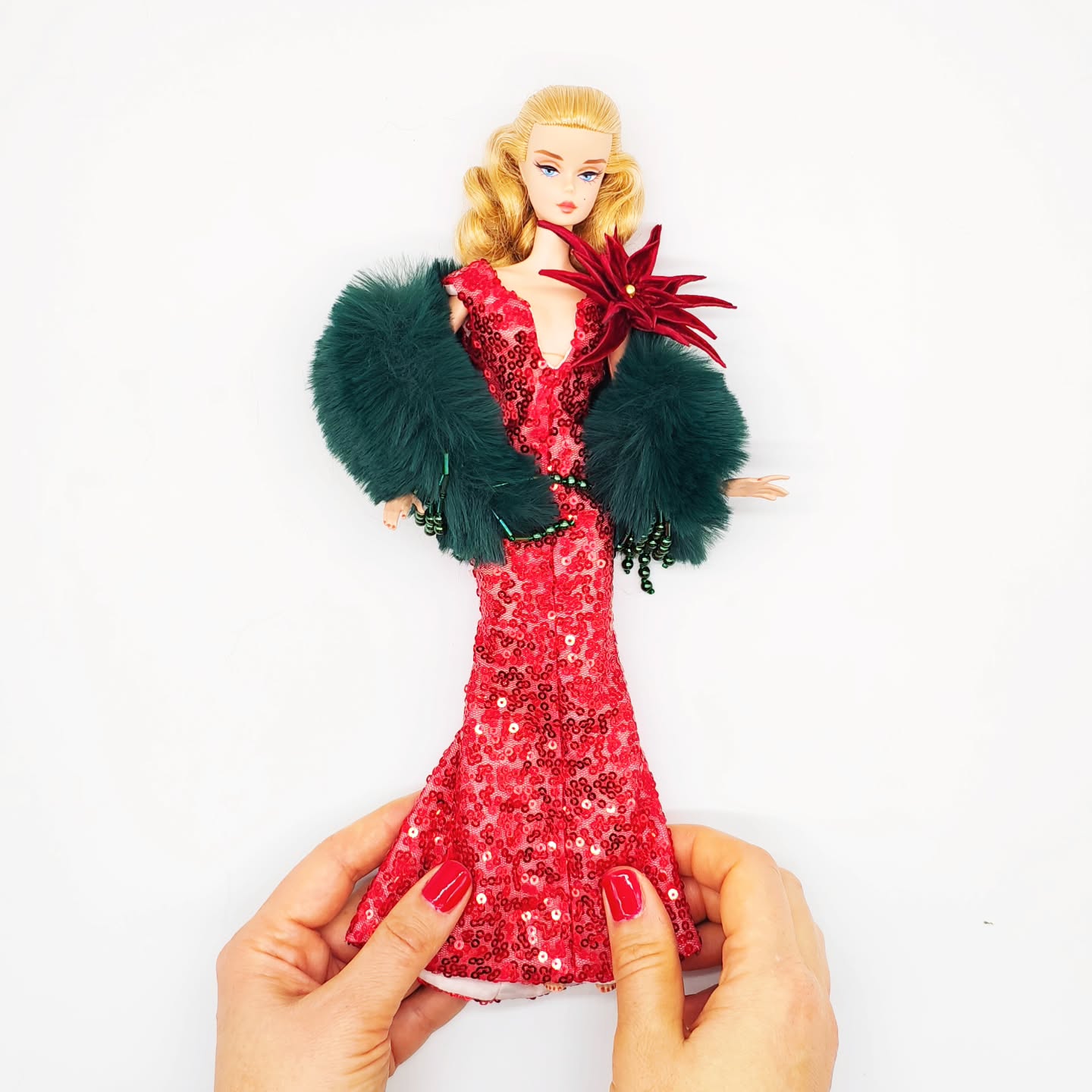 There is beauty in having something that arrives regularly. Not as a surprise for the sake of surprise, but as a steady moment of pleasure you can count on. A new piece of doll fashion arriving in the post can brighten a whole week. It gives you something to anticipate, to unwrap and to style. It’s a small reminder that beauty is still happening, even in the coldest months.
It’s one of the reasons some collectors choose to join our gtGdollwear’s Subscription Club. It offers a gentle, reliable way to enjoy collecting without pressure, decision‑fatigue and the noise of big releases. Just a quiet envelope of beauty that slips into the month like a soft reminder to pause and enjoy something lovely.
Poinsettia dress can be found in box no.2 of your subscription journey.
More at https://www.gtgdollwear.com/pricing-plans/list
#gtGdollwear #barbiesilkstone #integritytoys #barbiemtm #barbiecollector