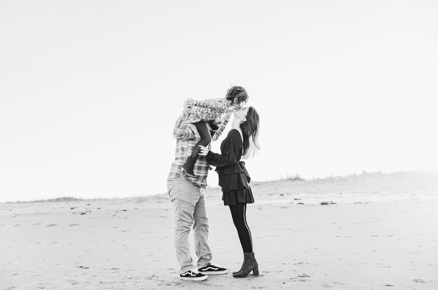 A quiet moment, a lot of love, and the kind of joy you don’t have to force.
Family sessions with me are relaxed, playful and centered on real connection. As a Virginia Beach family photographer, I focus on capturing families naturally - from sandy toes to shared laughter - preserving genuine moments that tell your story.