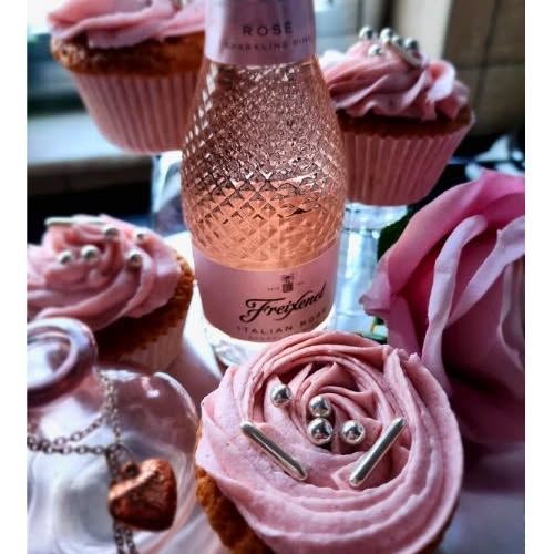 Indulge in a luxurious and decadent treat with our irresistible pink champagne cupcakes! These deliciously moist and fluffy cupcakes are infused with the delicate flavor of bubbly pink champagne and frosted with a smooth and creamy champagne buttercream frosting. The delicate pink hue and elegant presentation make them a perfect choice for any celebration or special occasion. Elevate your dessert game and treat yourself to our exquisite pink champagne cupcakes today!