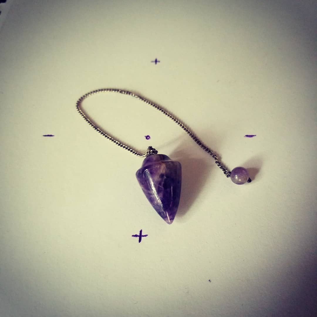 DIVINATION can be as simple as a pendulum and paper.
Yes or no questions are the rule.
I've been working with this amethyst pendulum lately and I'm astounded by the accuracy!
#divination #witchcraft #witchesofinstagram #pagan #pagansofinstagram #witchy #witch #magick #tarot #witchichick #bruja #occult