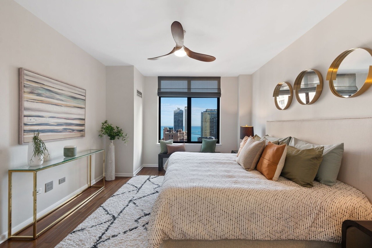 Bedroom with a view 🤩 #lakefront #view #skyline #chicago #chicagorealestate #havenhomestager #chicagohomestaging #stagingworks #stagingsells #staging #homestaging