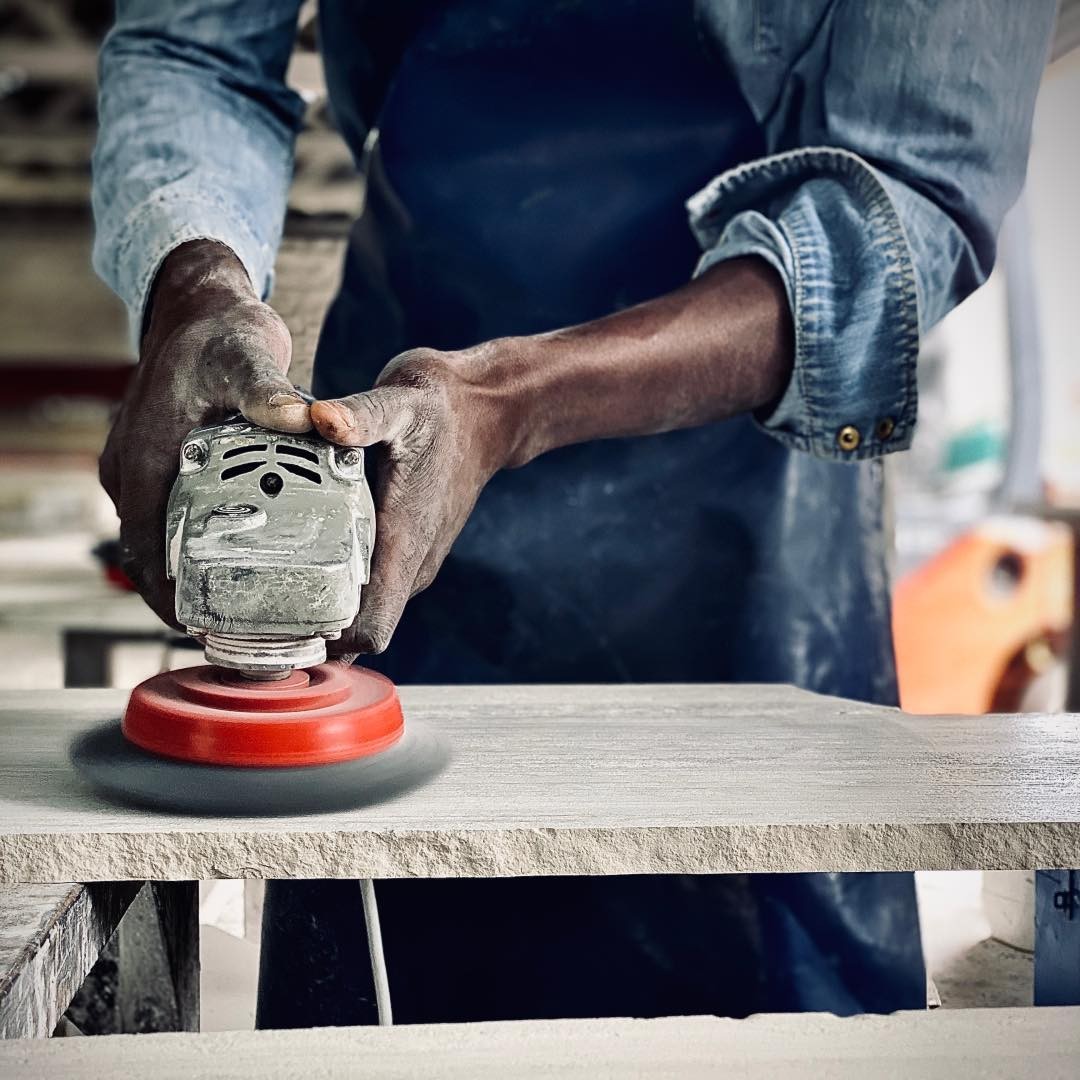 Adding texture to a natural stone slab to enhance the horizontal veining and neutral oyster grey colouration. Once the polish has been removed the true beauty of this stone is revealed. We are planning to make a monolithic plinth to showcase this incredible piece of stone @theconglomerate_sa
#theconglomerate #woodenwhite #naturalstone #craftsman #minimalisthome #simpledesign #furniture #functionalminimalism
