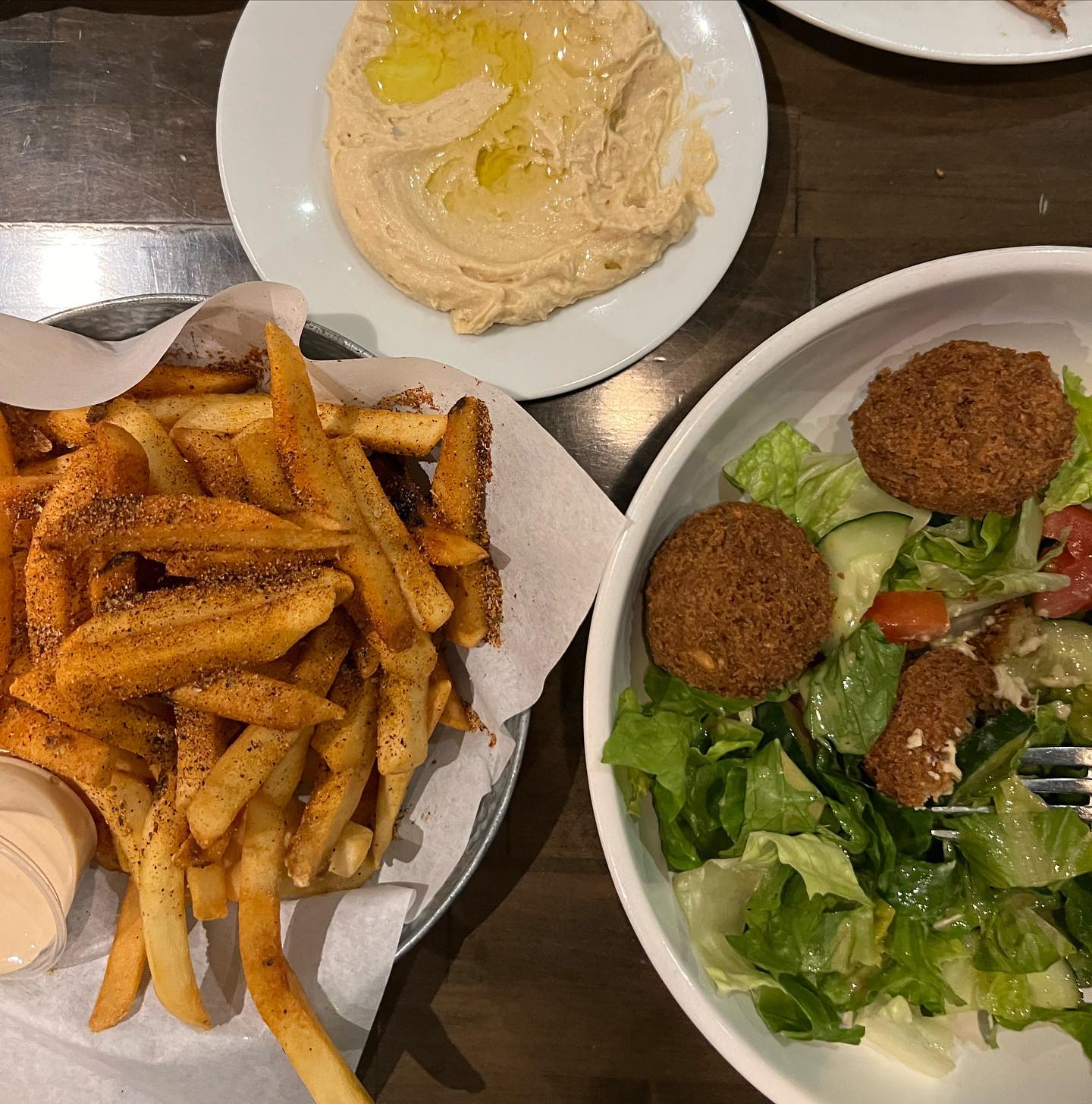 Broke what was pretty much an all day fast after hiking Mt. Rainier with some fresh Lebanese food in #Portland. It was all gone in minutes. 😋
.
.
.
#vegan #portland #oregon #pnw #veganinportland #veganlebanese #falafel #fries #dinner