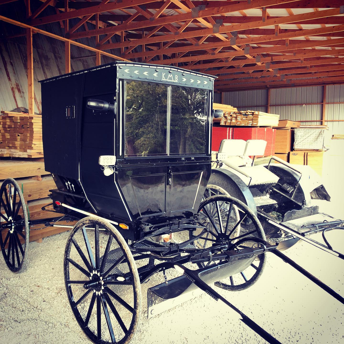 The official transportation of Kalona mini buildings. Do you see the logo? #sheshed #mancave #portable #backyard #kalona #iowa #amishcountry #affordable #mancave #garage #fall #autumn #handbuilt #craftsmen #buggy #amish #official
