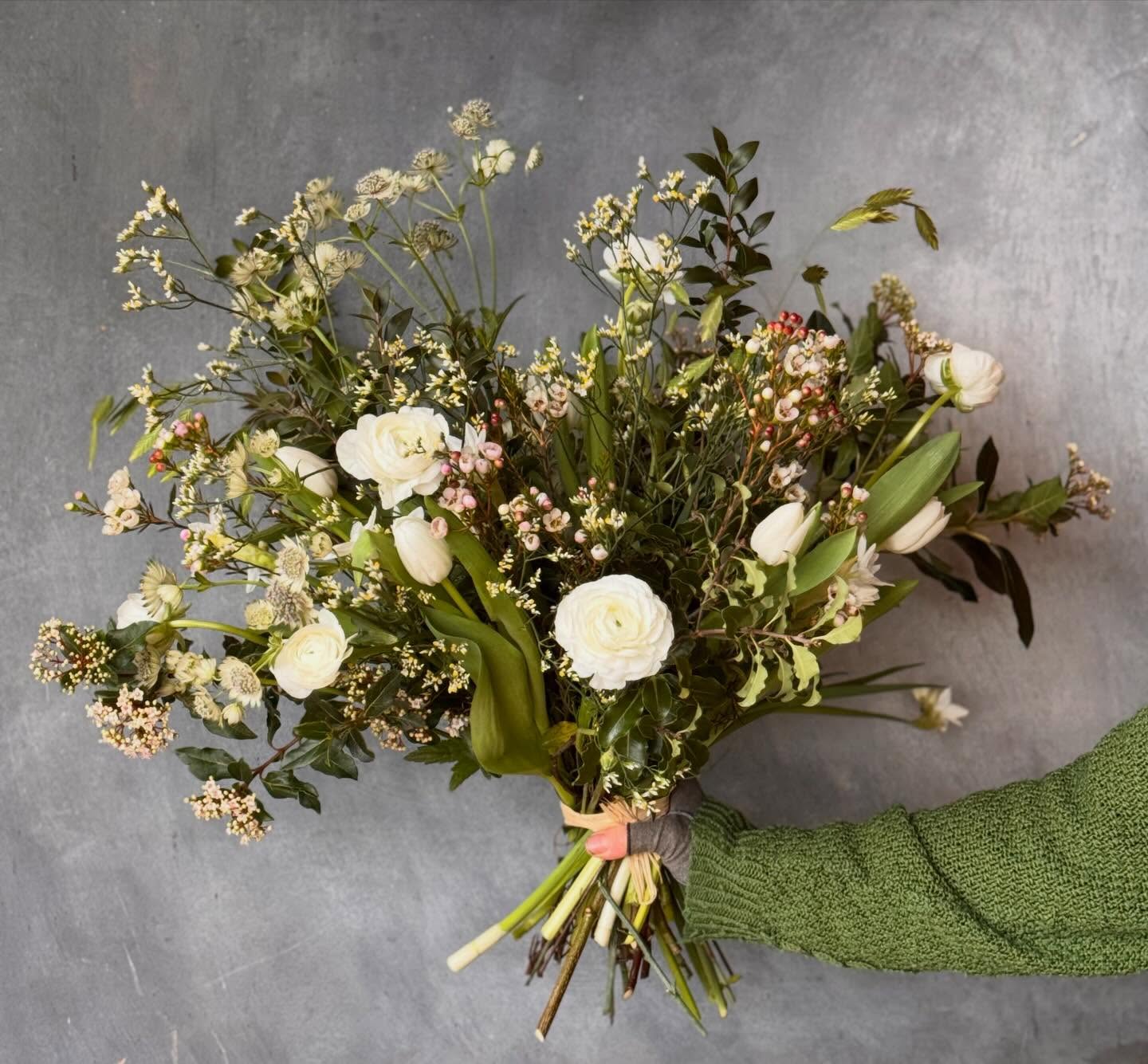 Feeling prevernal with this bouquet. Touches of Spring mixed with Winter foliage