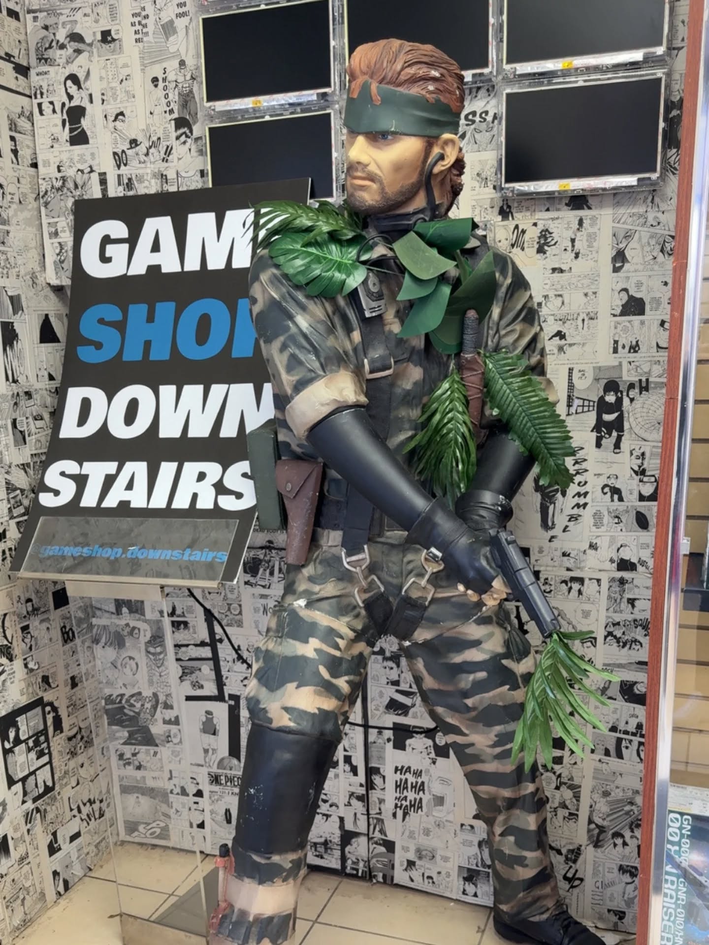 Have you visited Gameshop Downstairs (@gameshop.downstairs) in San Jose?
Last summer, this life size Naked Snake statue went on an adventure from his home at the store in San Jose to make a special appearance in MGSCON3's Metal Gear Museum. He had so much fun that he still hasn't taken off his camo leaf decor! 🤭🌿
Thanks, once again, to our supporters in the community like this S-tier game shop for making MGSCON special!
What do you think his camo index is?