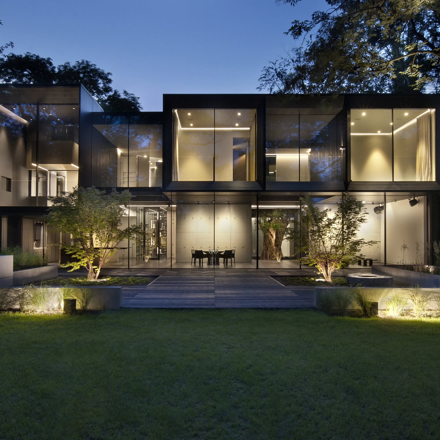 Building an architectural landmark in Highgate requires precision, technical expertise, and a total commitment to high-end craftsmanship. At Hira, we are incredibly proud of our work as the contractors for this extraordinary 6,200 sq ft residence.
The absolute showpiece of this build is the sculptural, floating helical staircase. Finished in a striking, vibrant red, this gravity-defying structure serves as the home's architectural pulse, winding through a triple-height space. Executing such a bold, complex design required meticulous engineering and specialist construction to achieve its seamless, "extra-special" finish.
Key construction features delivered by Hira:
The Red Helical Staircase: A bespoke, floating masterpiece that anchors the entire interior.
The Glass Atrium: A central sanctuary at the heart of the property housing a 1,000-year-old olive tree.
Massive Open-Plan Engineering: A 22-metre entertaining space featuring 20-metre glass sliding doors for a seamless indoor-outdoor transition.
Subterranean Luxury: Expert installation of a resistance pool, Jacuzzi, private gym, and a bespoke cinema room.
Specialist Storage: A sleek, glass-enclosed wine room designed to hold 1,000 bottles.
This project represents the pinnacle of modern luxury construction.
At Hira, we take pride in our ability to execute the most challenging and detailed visions to the highest possible standard.