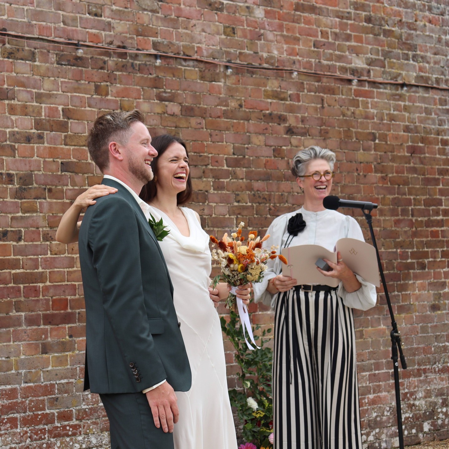 There's something truly magical about laughter at a wedding ceremony. Weddings remind us that love isn't just solemn or serious – it's joyful, lighthearted and real.
#weddingjoy
#loveandlaughter
#weddingday
#newlyweds
#weddingcelebrant
#celebrant
#celebrantwedding
#bespokeceremony
#awildecelebrant