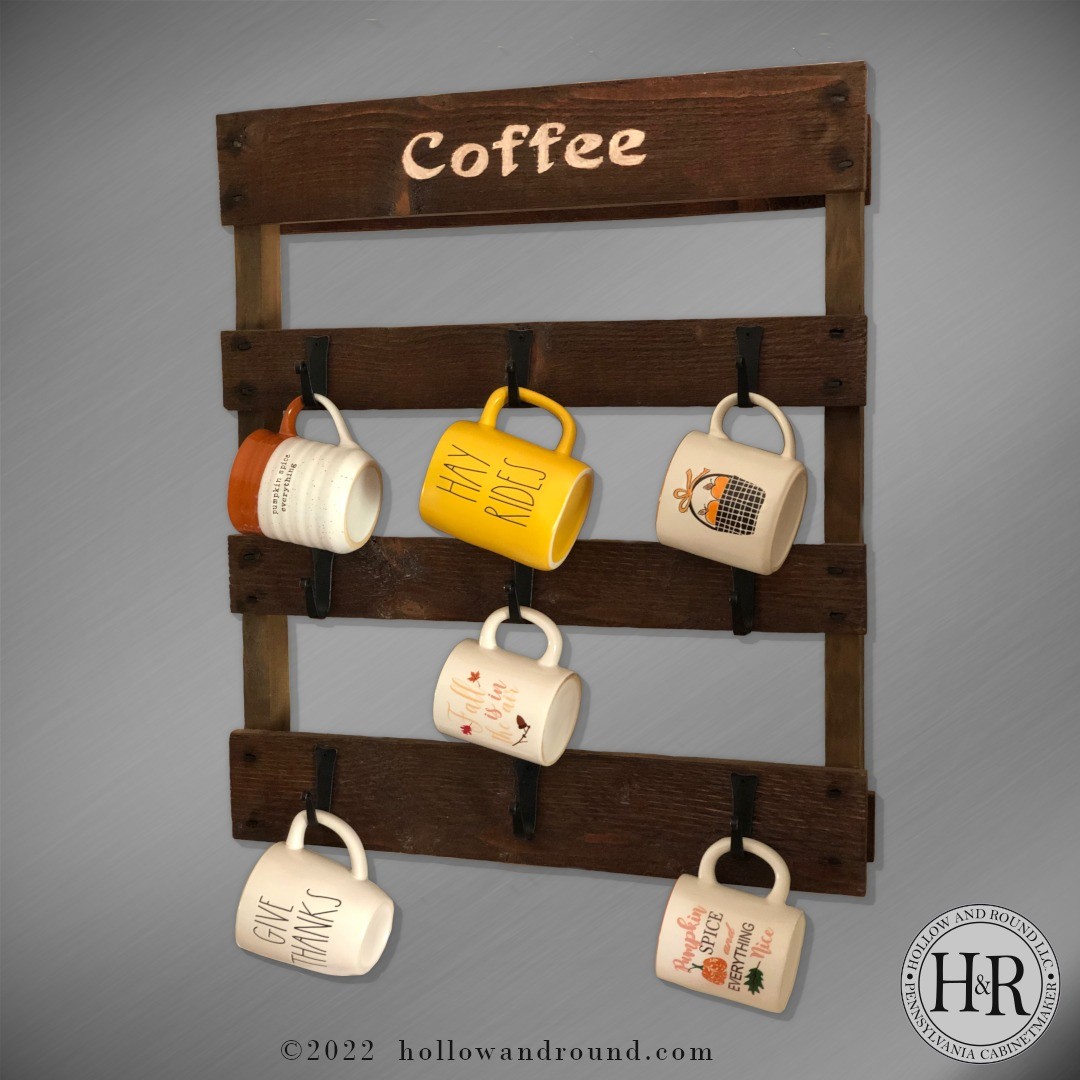 A weathered looking project, the look of barn wood or pallet like material. The rough face was a product of the saw mill, no need to do a faux effect here. Stained in walnut and finished in shellac, cool feature here is the cut nails which I heated with a torch and drove them in while still hot, adds to the look I thought.