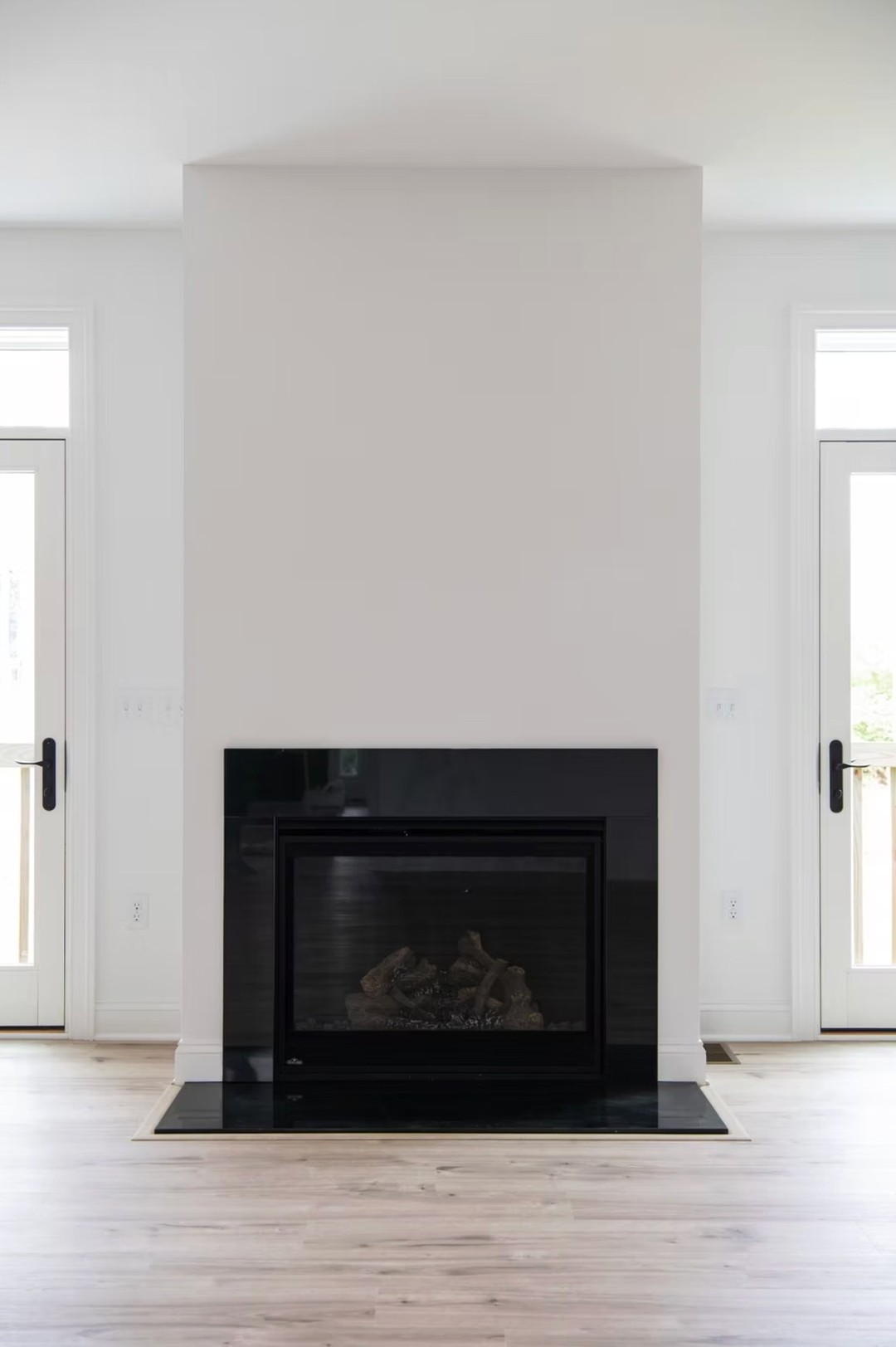 Where simplicity meets warmth. 🔥 This sleek and stylish fireplace is the perfect focal point for any great room. You can style this exact fireplace in our Charleston model, on Lot 33 in Fortunes Landing! 🌿 A stunning 4.40-acre lot featuring 4 bedrooms and 4.5 bathrooms—your dream home awaits. 🏡✨ Call 540-706-3265 for more details!