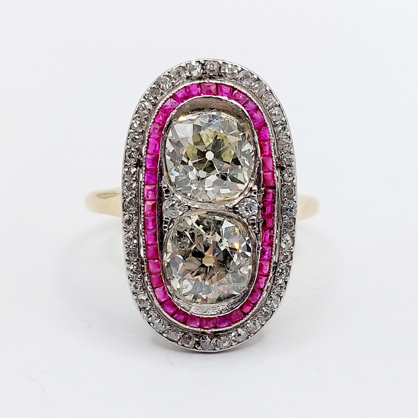 French art deco marquise ring 18k gold and platinum set with 3.50 carats of old mine cut diamonds surrounded by calibrated rubies and small old cut diamonds (circa 1910)
PRICE : 10900€
Magnificent and rare work by a French goldsmith from the Art Deco period
Size: 57 FR / 8 US
Weight: 5.64 g
Diamond 1: Approximately 7.4 x 6.8 x 4.5 mm (estimated at 1.70 carats)
Diamond in perfect condition, slightly yellow, multiple inclusions visible to the naked eye
Diamond 2: Approximately 7.0 x 7.0 x 5.0 mm (estimated at 1.80 carats)
Diamond in perfect condition, slightly yellow, no inclusions visible to the naked eye
Head size: 24 x 14.6 mm
Micro scratches from use, traces of old repairs/soldering
Owl and mascaron hallmarks (French hallmarks)
#diamondring #marquisering #frenchjewlery #frenchring #navettering #rubyring #haloring #diamondhaloring #artdecoring #targetring #omcdiamond #oldminecut #oldminecutdiamond