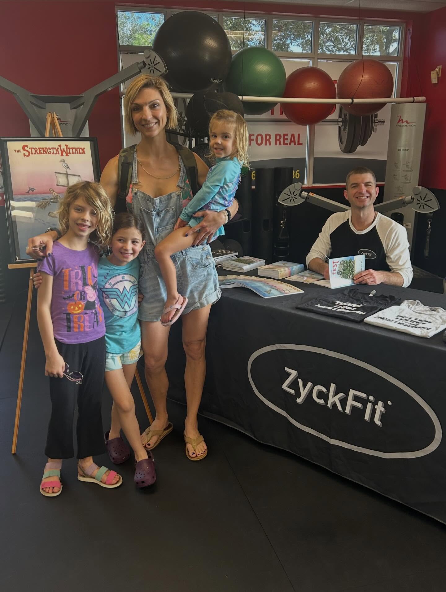 Today was a fun day at @realfitnessjupiter for the “The Strength Within” book release! Thank you to everyone who came out to support!
DM me for signed copies or order online through www.zyckfit.com 💻
Available on Amazon soon!
#ZyckFit #SelfPublishedAuthor #TheStrengthWithin #ChildrensBook #KidLit