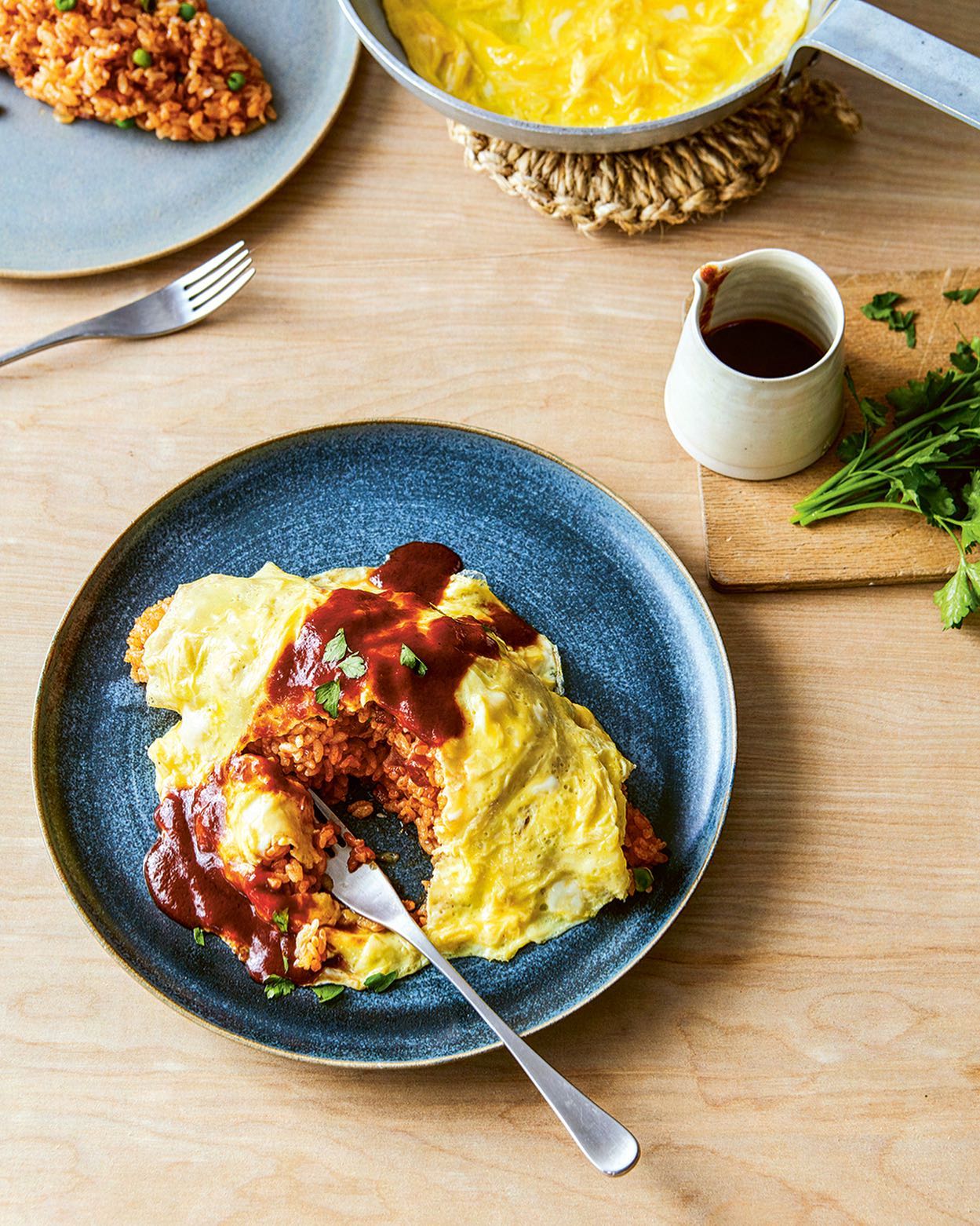 OMURICE
“Omu” refers to the omelette encasing the fried rice. The typical way of making “omurice” is to wrap the fried rice with the omelette. This recipe makes for an open omelette, laid on top of the fried rice, which is easier to make and just as tasty.
Making omurice brings me back memories of my school days. Omurice was my favourite dish and it was the first I learnt to cook. I was obsessed with it. It took me so long to master its perfection: placing the omelette perfectly to wrap the fried rice.. But to make things simpler, I found the idea of the open omelette works even better!!: the soft cooked egg melting over the fried rice made me even more mad about this dish. I hope you love this as much I do!
Link in bio for a full recipe.
Here, I would like to share some of my favourite one bowl/plate recipes from my cookbook #atsukosjapanesekitchen with you, so make sure you follow for more!
Image by @yukisugiura.photo
Recipe + food styling @atsukoskitchen
Prop styling @alexanderbreeze
Publisher @rylandpetersandsmall
#recipeoftheday #recipeshare #atsukosjapanesekitchen
#homemadefood #homecook #homecookedfood
#yoshoku #oneplatemeal #オムライス #おむらいす