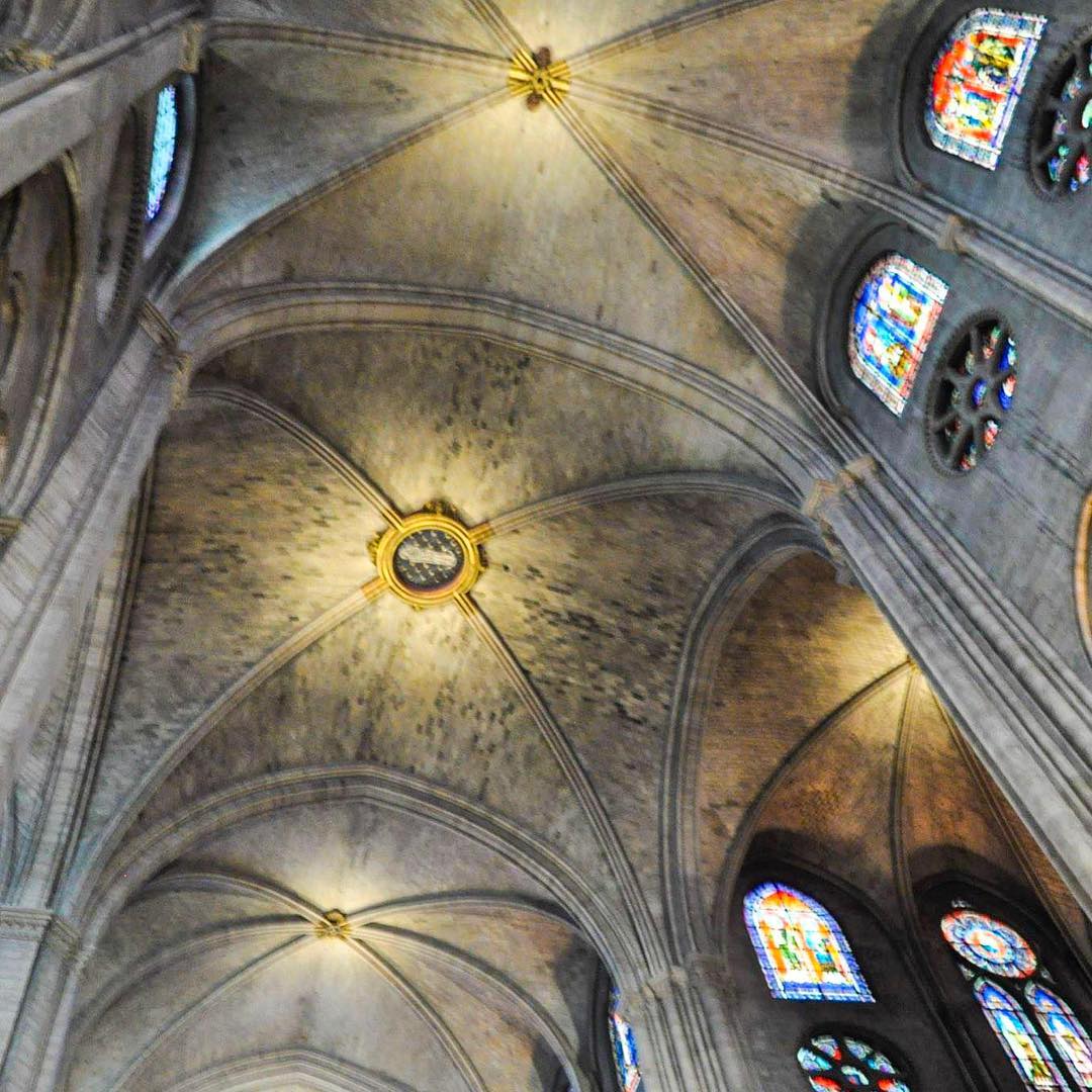 Ashley and I did a lot of our traveling during undergrad, something none of our parents were particularly thrilled by. My defense to my parents has always been that I might as well take this trips while I can, before I’m working full time or married or have kids. Something I never really considered about our is how lucky we were to see certain things. You never really think of something that has been around for hundreds of years and is one of the most visited buildings in the world as something you’re lucky to visit. Until you watch news coverage in horror as a building that has withstood pillages and wars burns and collapses.
I love taking architecture/design photos, and have found churches and cathedrals to be some of the best buildings to take them in. Notre Dame is no exception. I adored the ceilings and stained glass windows, and the photos I took there were some of my favorite from our entire trip to Europe. Appreciate the places you go and the things you see, because you never know when you won’t be able to anymore.