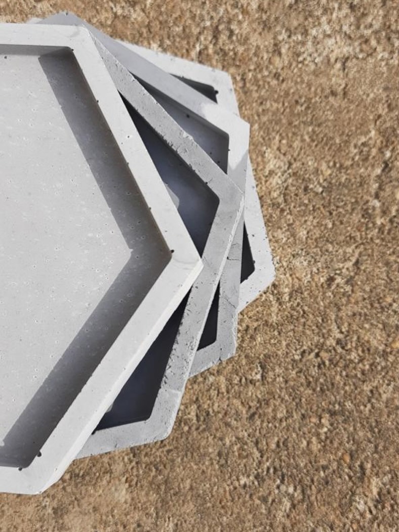 Run your fingers over concrete.
It is softer than you expect.