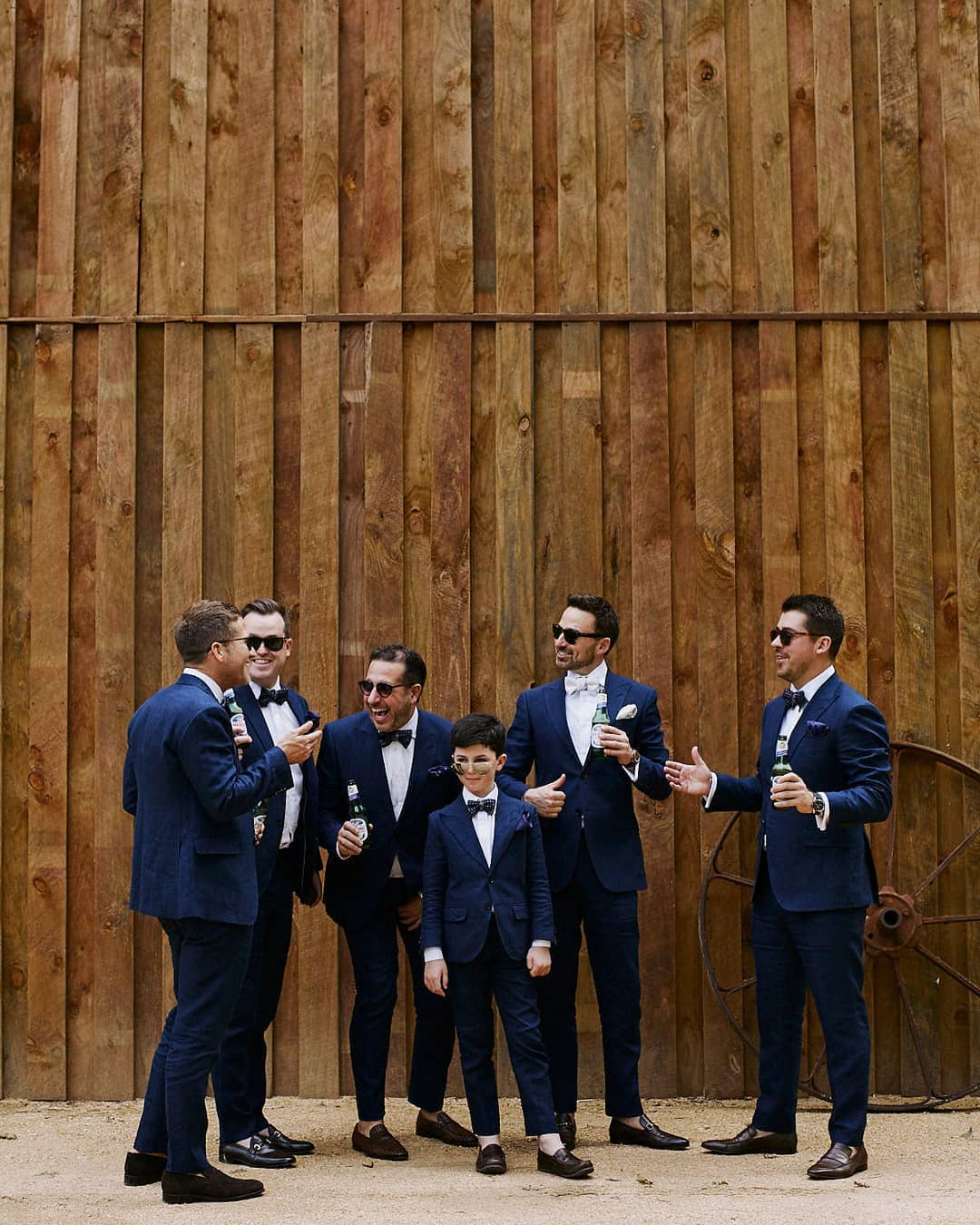 Cam and his groomsmen having a bit of fun pre ceremony. We love the boys' navy suits against our timber barn! 📷 @the_loved_ones
Suits by @brentwilsonfashion
.
.
.
.
.
.
.
#herestothegriers #weddingbarn #groom #groomsmen #barnwedding #gardenwedding #countrywedding #weddingstyle #weddinginspiration #weddingday #weddingphotography #wedshed #homestead #love