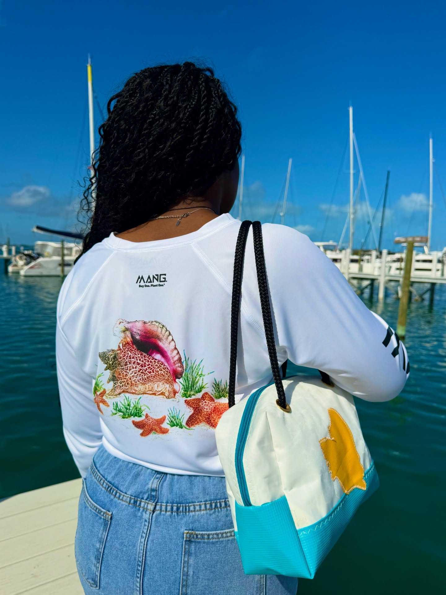 Did you know you can grab Mang apparel at our Marsh Harbour location? Perfect for breezy boat days ⛵️🌊