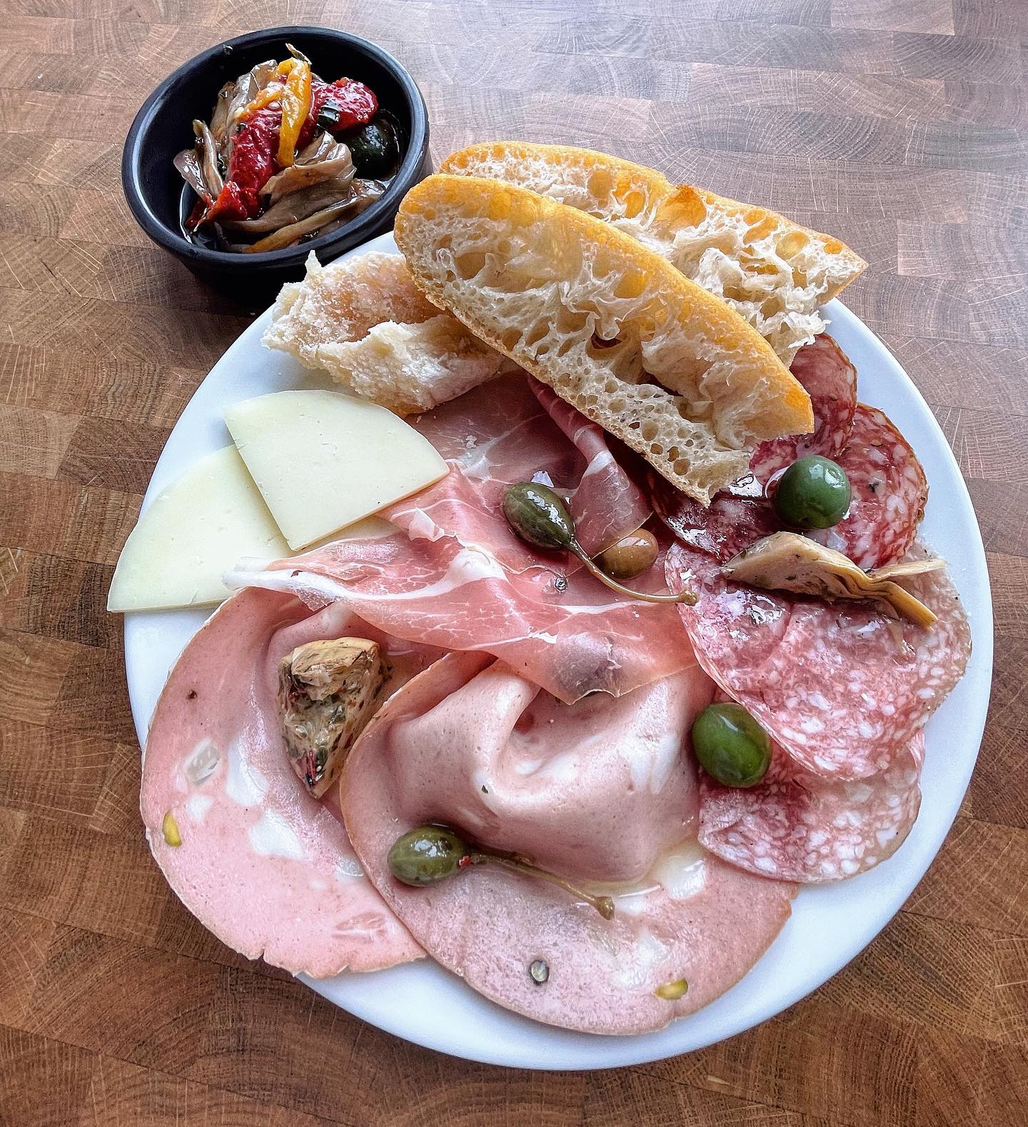 Our antipasti plate to share features freshly sliced pistachio Mortadella, fennel salami, Prosciutto, Milano salami, young Pecorino and aged Parmesan cheeses, home made focaccia and grilled and marinated vegetables
#antipasti #selection #food #fresh #delicious #maidenhead