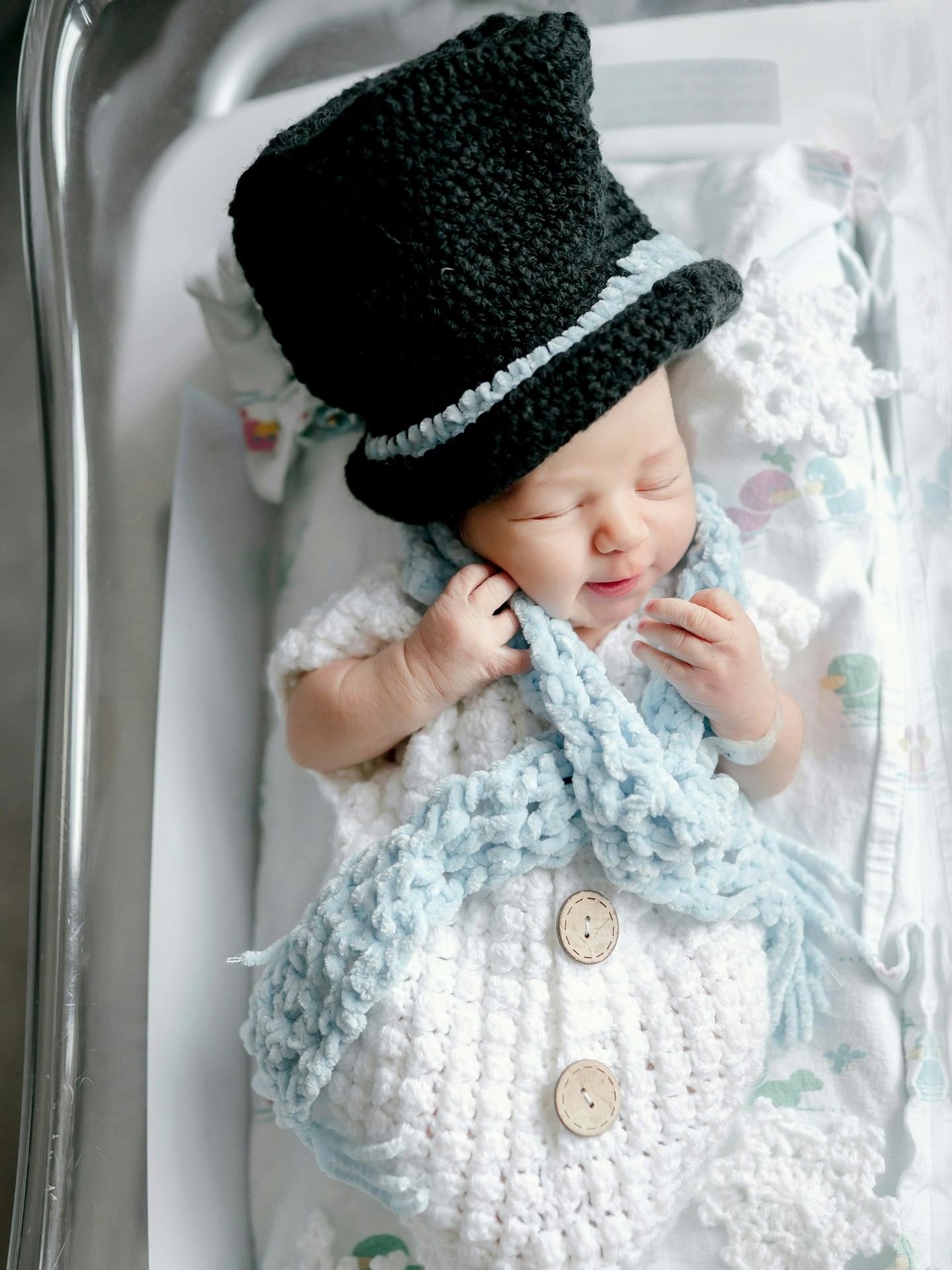 With snow finally in our forecast, these @williamson_hlth newborns are bringing our winter wonderland dreams to life ❄️
Dressed as a snowman and snow woman in one-of-a-kind outfits crocheted by Williamson Health EMS member Debi Reynolds, these frosty friends are embracing the beauty of winter weather. We hope these snowy snapshots, captured by @kristielloydphotography, warm your heart—and the hearts of those around you!
So, wear your pajamas inside out and get the hot cocoa ready—here’s hoping for a safe, snowy weekend!