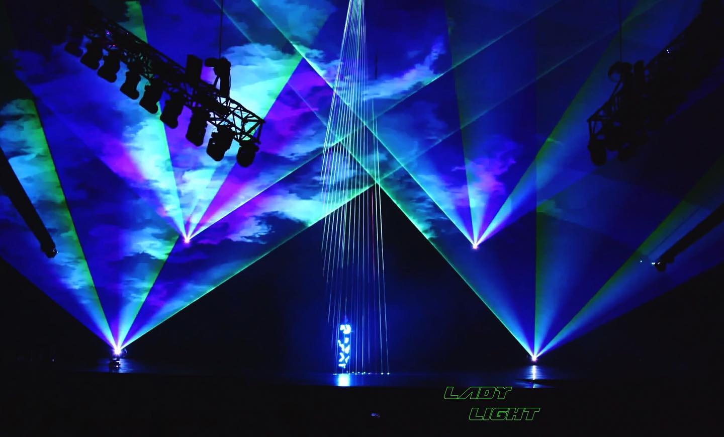 Snapshot from one of my performances in Taiwan with @lumia_light_show. The stage was massive- I look tiny, but the lasers look great! More photos and video to come……. #lasergirl #laseract #lightbender #lightsuit #dancer #wowfactor #eventprof #eventplanner #arenashow #laserman #hitech #womenintech