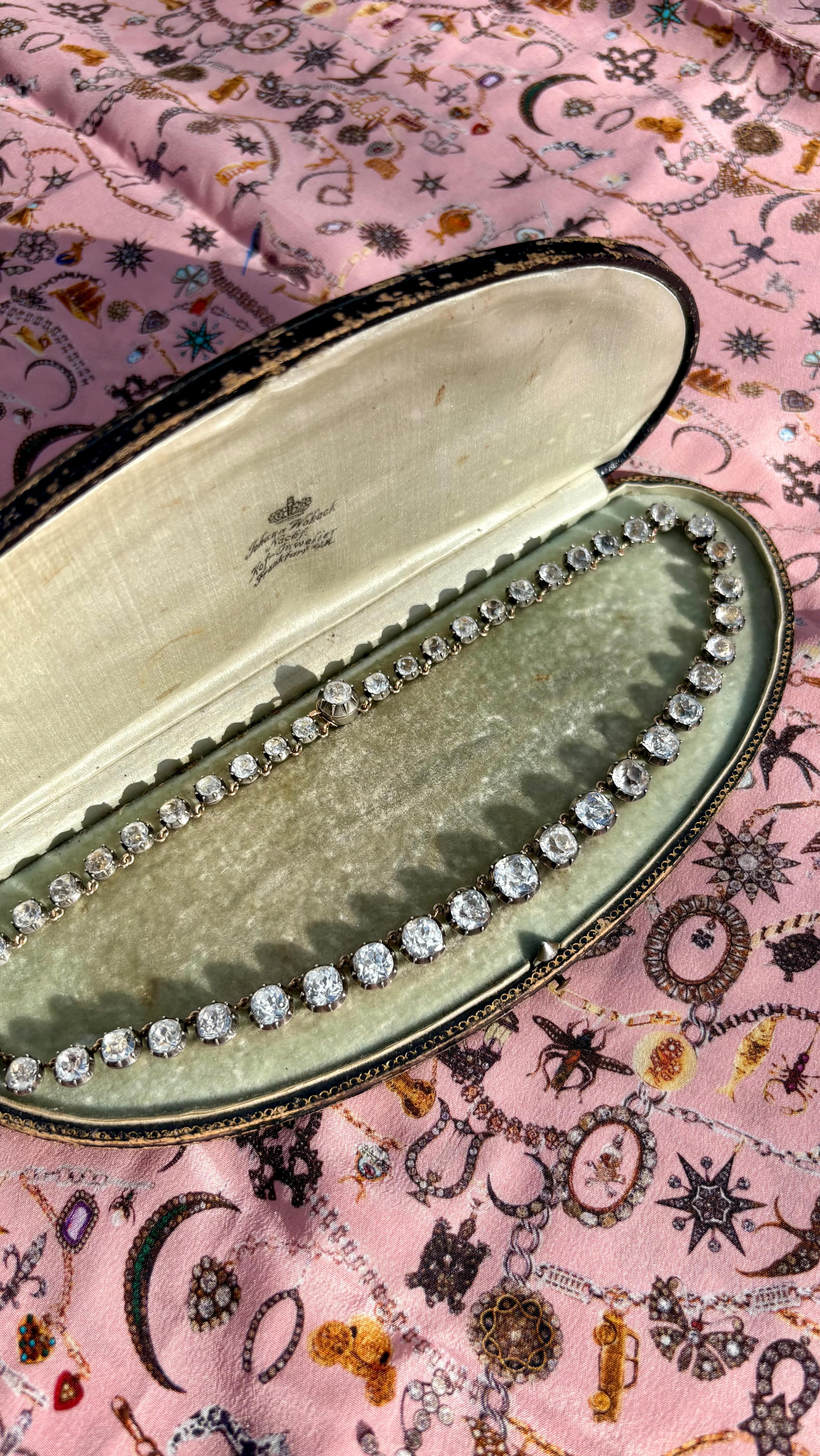 French c1850 Demi Parure. Consisting of a wonderful cushion cut sparkling paste Rivière and front closing Dormeuse earrings. Both set in silver and 18k Gold.