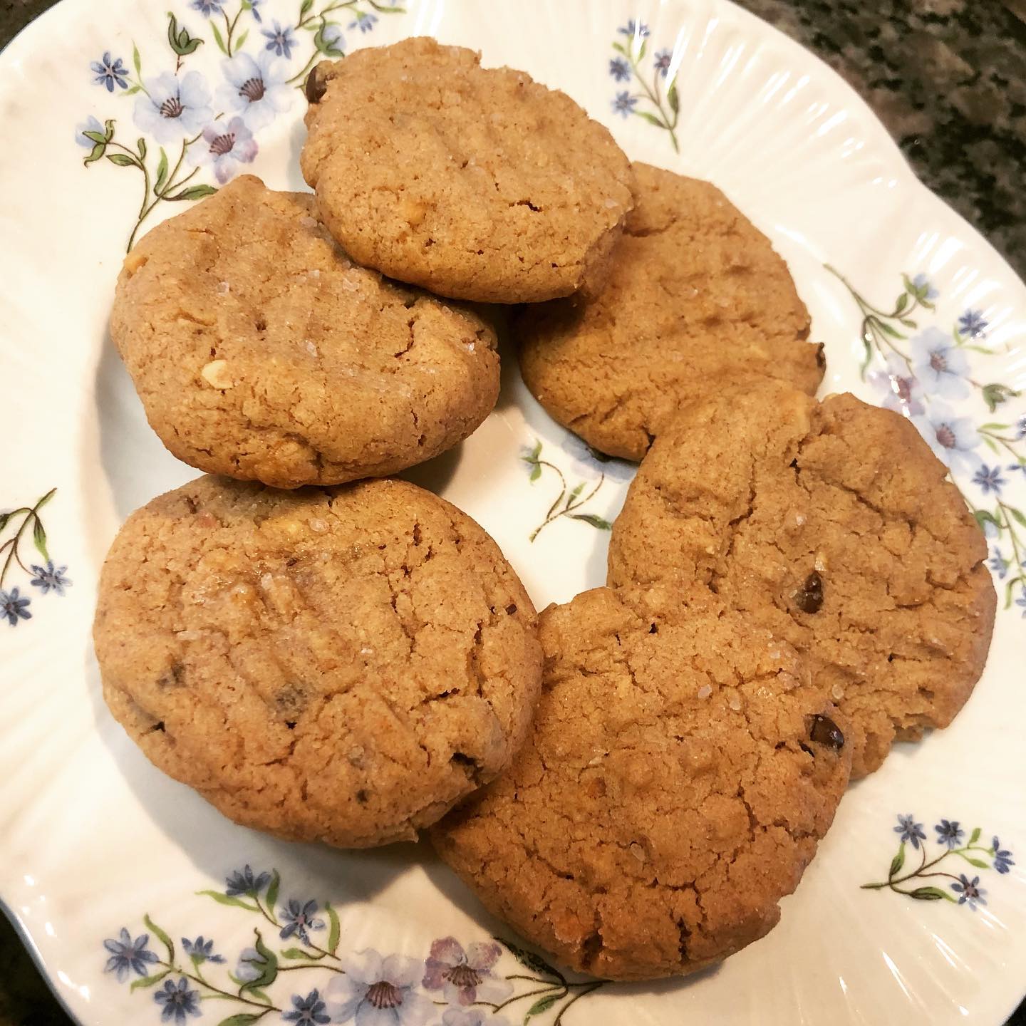 🥜 5 Ingredient Peanut Butter Cookies 🥜
If you think that you have a favorite cookie, then put it to the test. These cookies are SO GOOD! May or may not be made in my home on a weekly basis. Thank you @pcatsos! Buy her book.
INGREDIENTS:
1 large egg
1 cup peanut butter (I prefer crunchy natural before refrigerated)
3/4 cup sugar, plus extra for pressing cookies
1/4 cup semi-sweet chocolate chips
1/8 teaspoon sea salt or kosher salt flakes
DIRECTIONS:
1. Preheat oven to 350.
2. Combine egg, peanut butter, and sugar until smooth
3. Stir in chocolate chips
4. Using your hands, form the dough into 1 inch balls and place on cookie sheet
5. Use the back of the fork to press a cross cross design. Dip in a small amount of sugar in between cookies to prevent from sticking
6. Sprinkle the cookies with salt
7. Bake for 12-14 minutes
8. Let them cool before storing in an air tight container (I use a freezer ziplock to store for later…that day…)