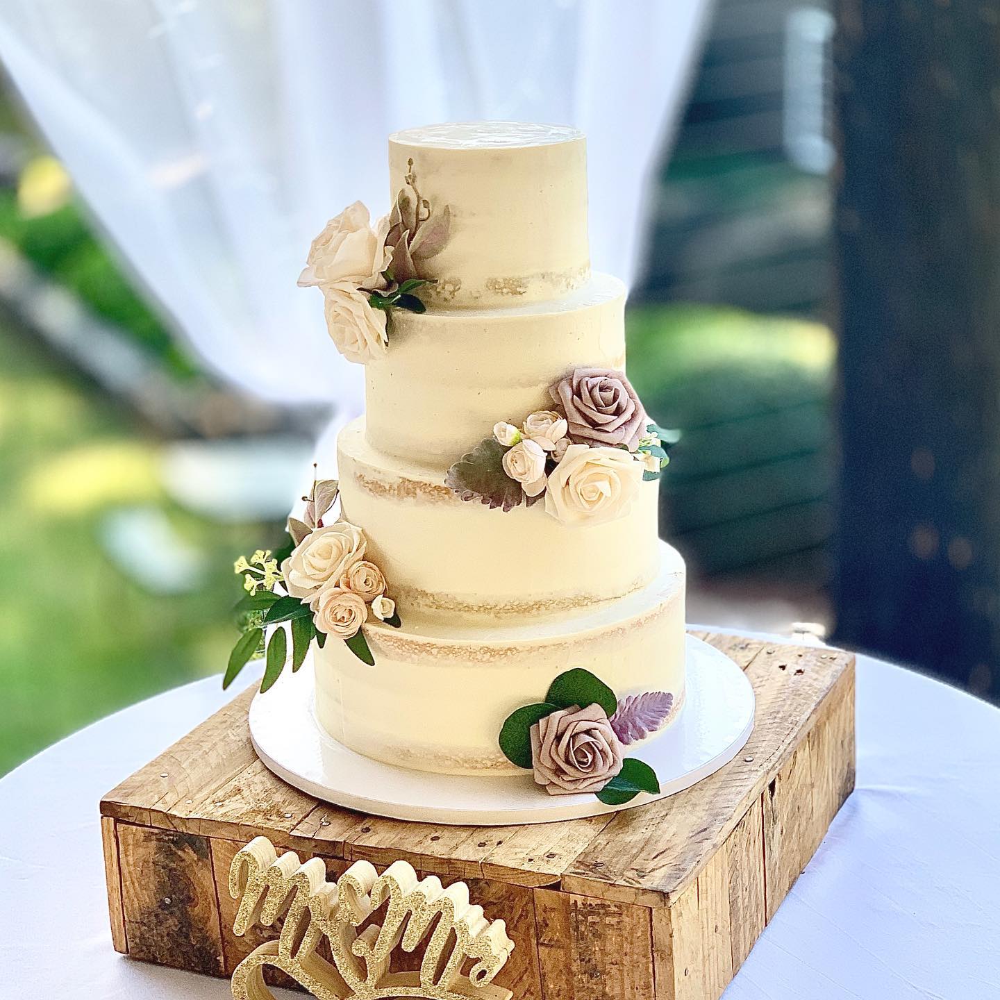 This naked cake design was part of a lovely backyard wedding. As always, @theseasonevents created a beautiful event. #weddingcake #southernwedding #southernweddings #southerncharm #southernliving #weddingday #georgiawedding #cottagebakery #cakeoftheday #cakesofinstagram #instagood #instacakedesign #instacake #backyardwedding #weddingcakeideas #cartersvillega #romegeorgia #cakedesign #nakedcake