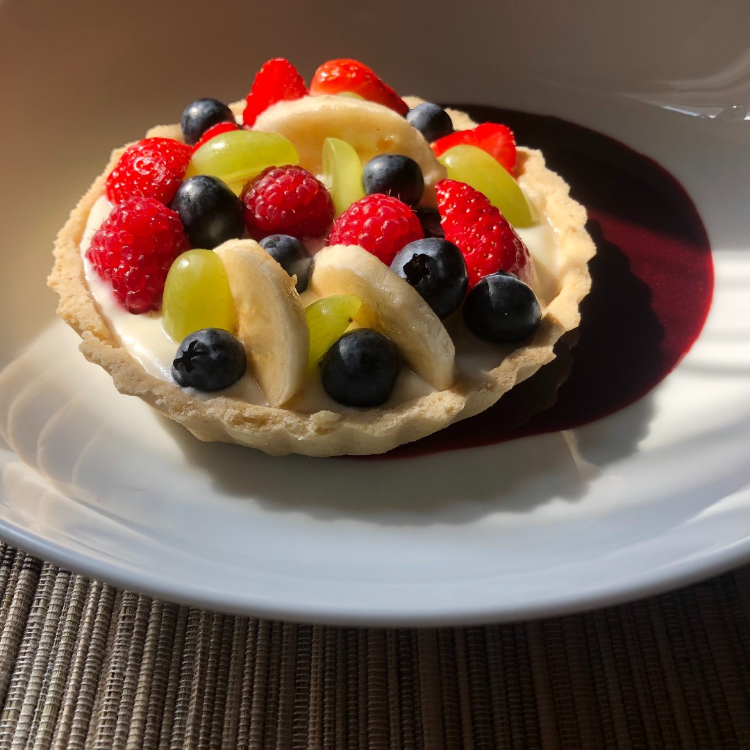 Fruit tart with blackberry coulis.
H E A V E N L Y