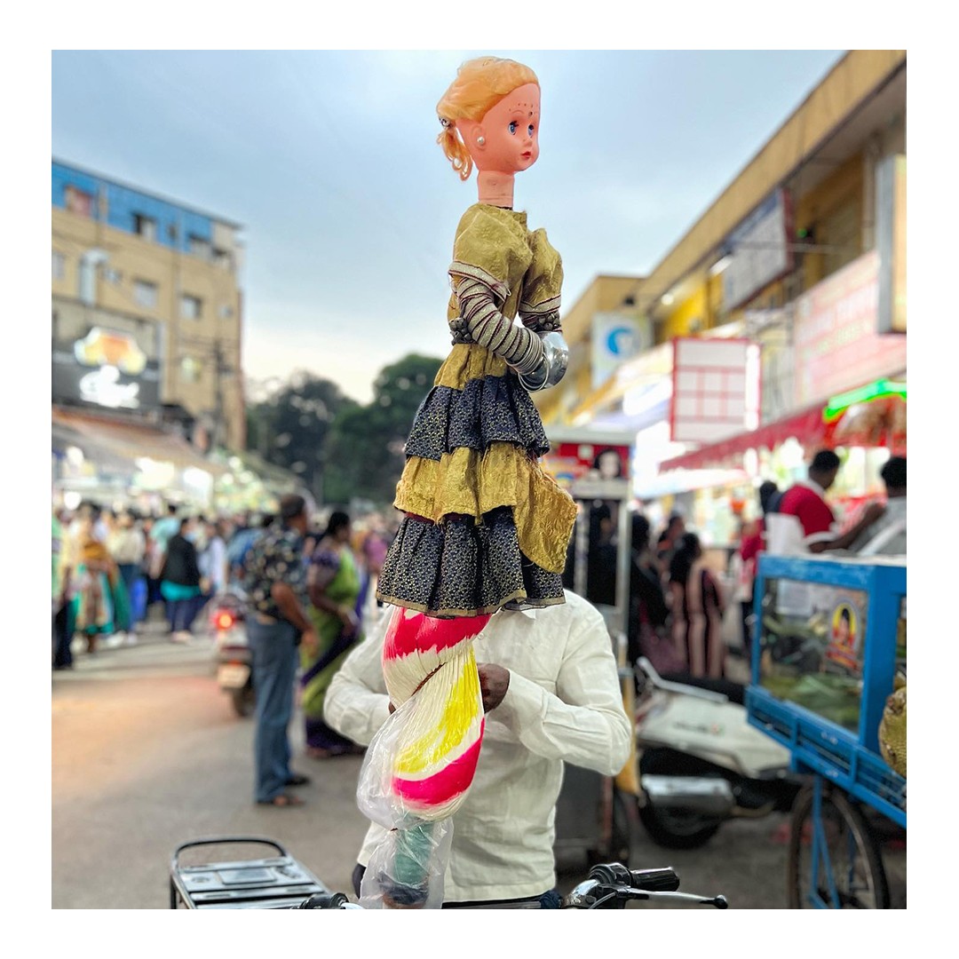 Javvu Mittai/ Bombay Mittai
.
Cultural / Food
.
If you are the 80s or 90s South Indian Kid, you need no introduction to the Bombay Mittai. The distinct clap of two hollow bells and the toy flute mimicking " Pappa! Pappa! (Children! Children!)" will bring things to a halt. Children would scurry to dip into their piggy bank or pester their parents for a coin or two. All this commotion to welcome their very own Pied Piper, the Bombay Mittai Vendor.
He is the magician of our times who can weave anything out of his Mittai into a reality. Be it a humble flower to a delicate peacock, his skilled hand would manifest anything we could think of. His Mittai Stick itself is a work of art. A long bamboo or wooden stick with a Doll on top of it all decked up and would clap with a pull of a string. The Multicolour Mittai is then wrapped around the shaft and comes down all the way to the reach of his hand. The vendor will also have a Toy flute to call out to his tiny customers.
Two decades back, the Bombay Mittai was one of the first interactions of Children towards color, imagination, and design.
With the increase of more and more packed candies available everywhere, this Bombay Mittai has dwindled down. However, it is still survived by a few people who do it out of passion, and you can still spot one if you are in luck.
Photography @ashwin_yoganand
.
.
EDA is a crowdsourced archive of Everyday design from the Indian Subcontinent.
Follow @everydaydesignarchive for more.
.
.
.
.
.
.
.
.
.
.
.
.
.
.
.
.
.
.
.
.
.
.
.
#design #everyday #dailyobjects #designerobjects #homemade #artisanal #craftsofindia #artistsofindia #designarchive #indiansubcontinent #india #productdesign #accessorydesign #householdobjects #everydaydesignobjects #bombaymittai #90s #candy #streetphotography #javvumittai #nostalgic