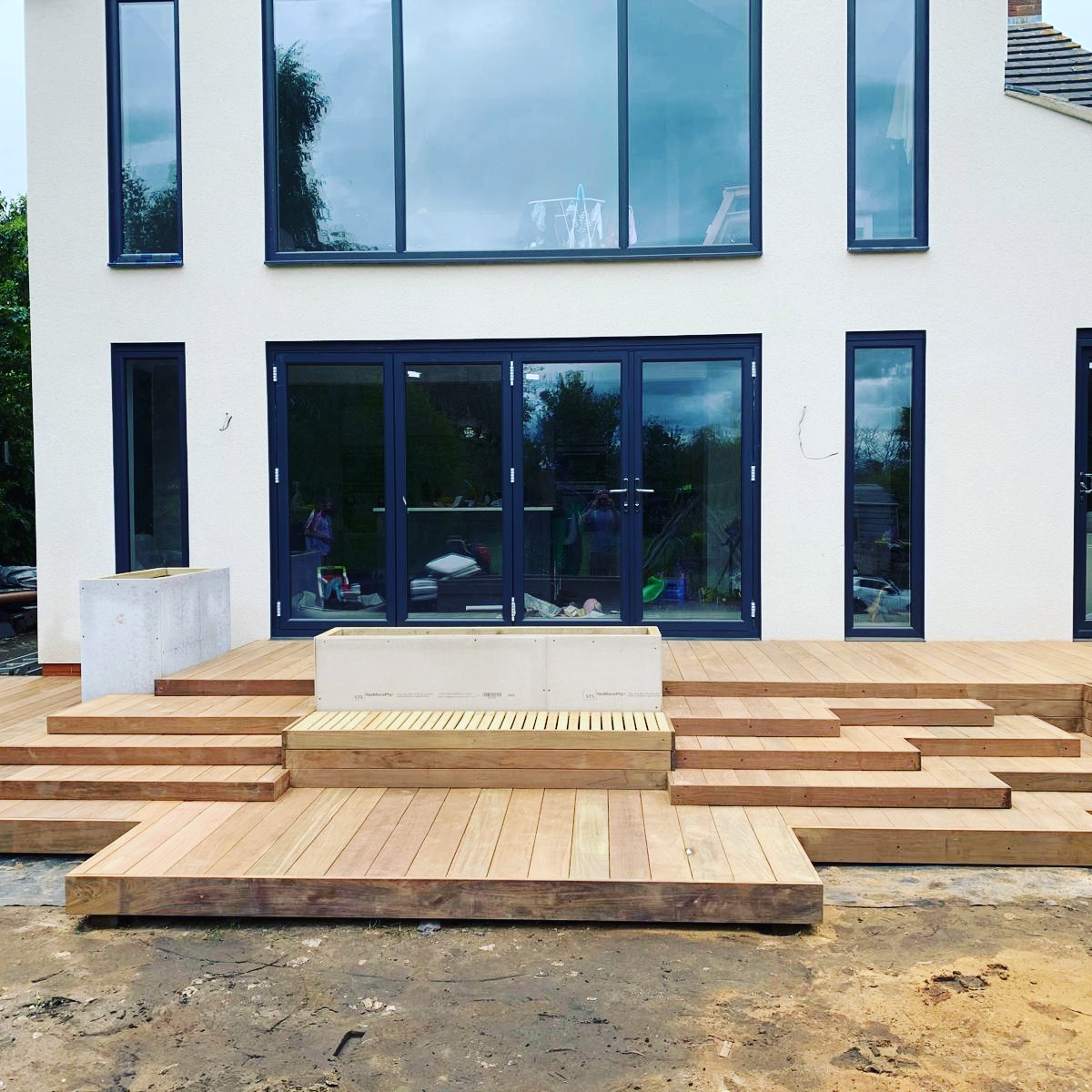 Fancy a customer built Deck with built-in seating and planters. Our highly skilled team carries out all of our own joinery.