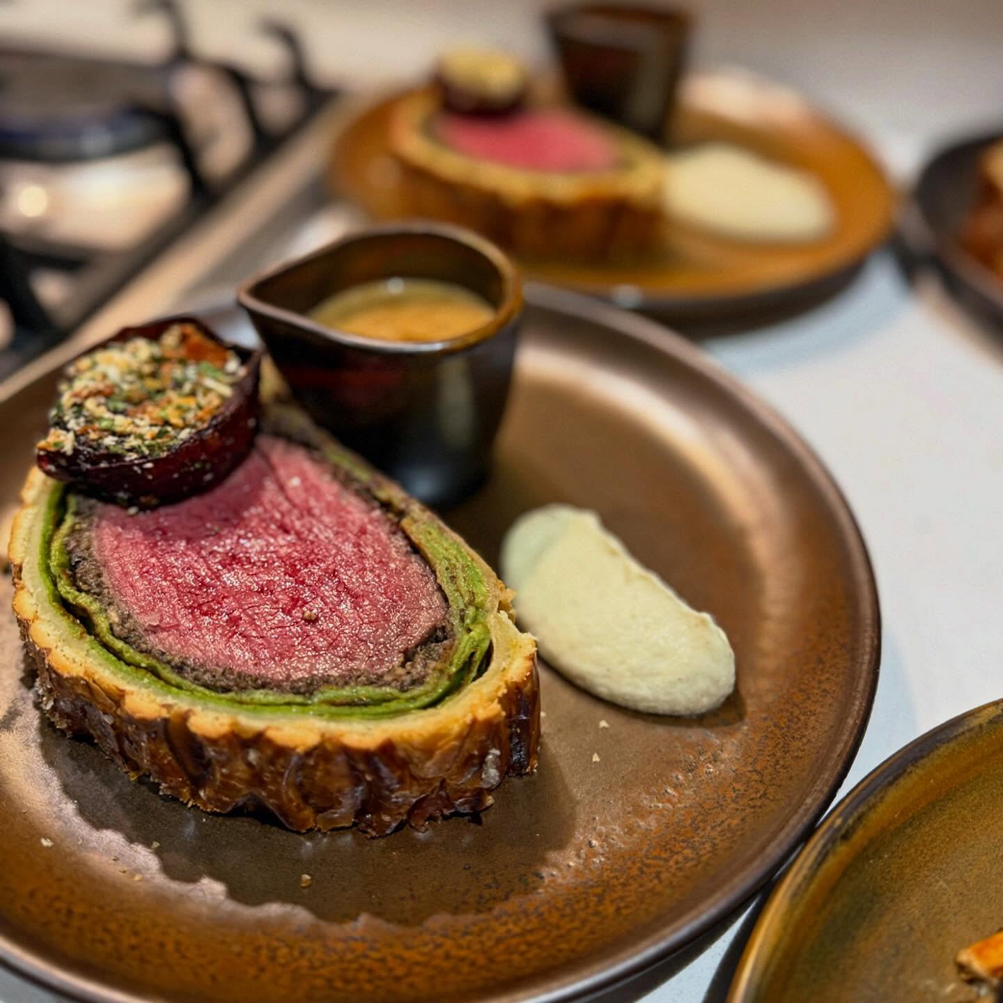 🍴THE BEEF WELLINGTON EXPERIENCE
This 5 Course Menu Is Celebrating The Incredible Beef Wellington.
A True Classic On Any British Menu, We Wanted To Celebrate It In All Its Glory.
31 Day Dry-Aged Scottish Prime Beef Fillet Wellington
Served With
Duck Fat Roast Potatoes - Roast Celeriac Purée Whisky Peppercorn Sauce - Seasonal Vegetables
📝 THE DUKE OF WELLINGTON
It is generally agreed that the dish was created in celebration of the first Duke of Wellington, Arthur Wellesley, and his victory at the Battle of Waterloo on June 18 1815.
The Duke was given his title after defeating Napoleon Bonaparte the year before, and not long after he became Prime Minister.
Such an iconic character needed immortalising, so (naturally) they named a pastry ensconced beef dish after him.