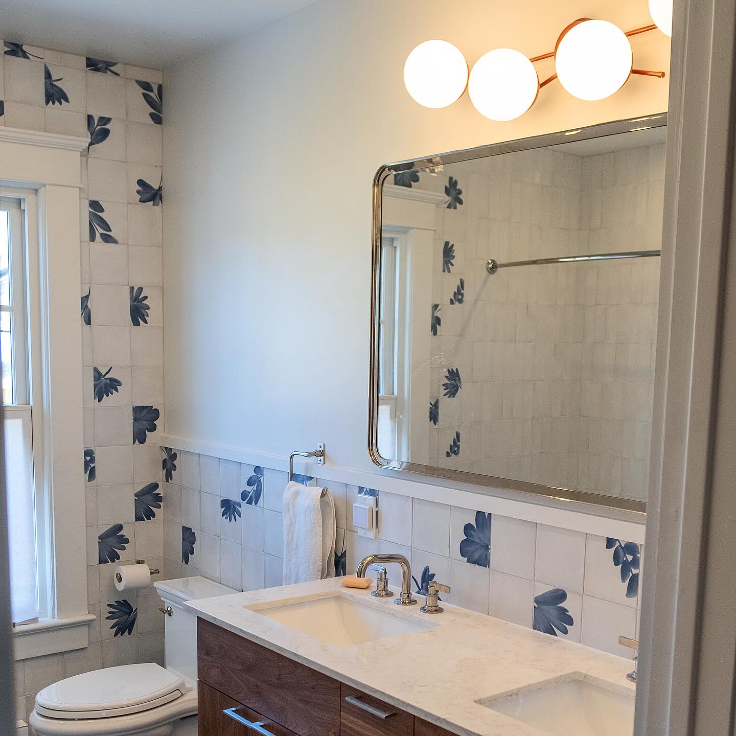 Believe it or not, we actually considered keeping the amazing vintage tile in this bath (see the before 👀), but our GC let us know there was extensive cracking and that restoring it would cost more than starting fresh.
Instead, I used that original tile as inspiration, sticking with blue tones and something a little ornate. When I shared this tile as a tentative option, my clients were instantly on board and away we went.
With all the white in the space, I needed something warm to break it up, and this dark @roomandboard walnut vanity did exactly that. Add a little whimsy with the amazing @discovervelora light, a giant nickel mirror, and a killer floor tile, and we landed on a bathroom that works just as well for kiddos as it does for adults.
I really love how this one turned out. 🤍
Photos by @breakerzee
Design by #shanalutherinteriors
#bathroomdesign #homerenovation #interiordesign #homedesign